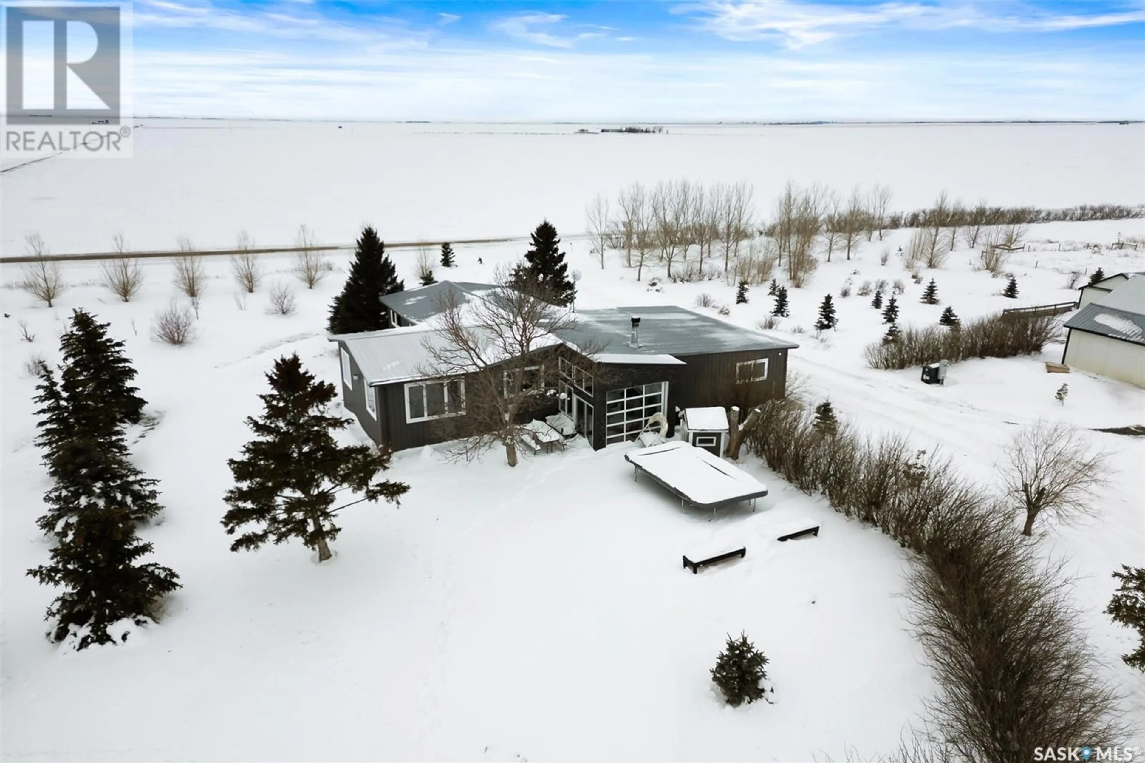 A pic from outside/outdoor area/front of a property/back of a property/a pic from drone, water/lake/river/ocean view for McChesney Acreage, Edenwold Rm No. 158 Saskatchewan S0G2T0