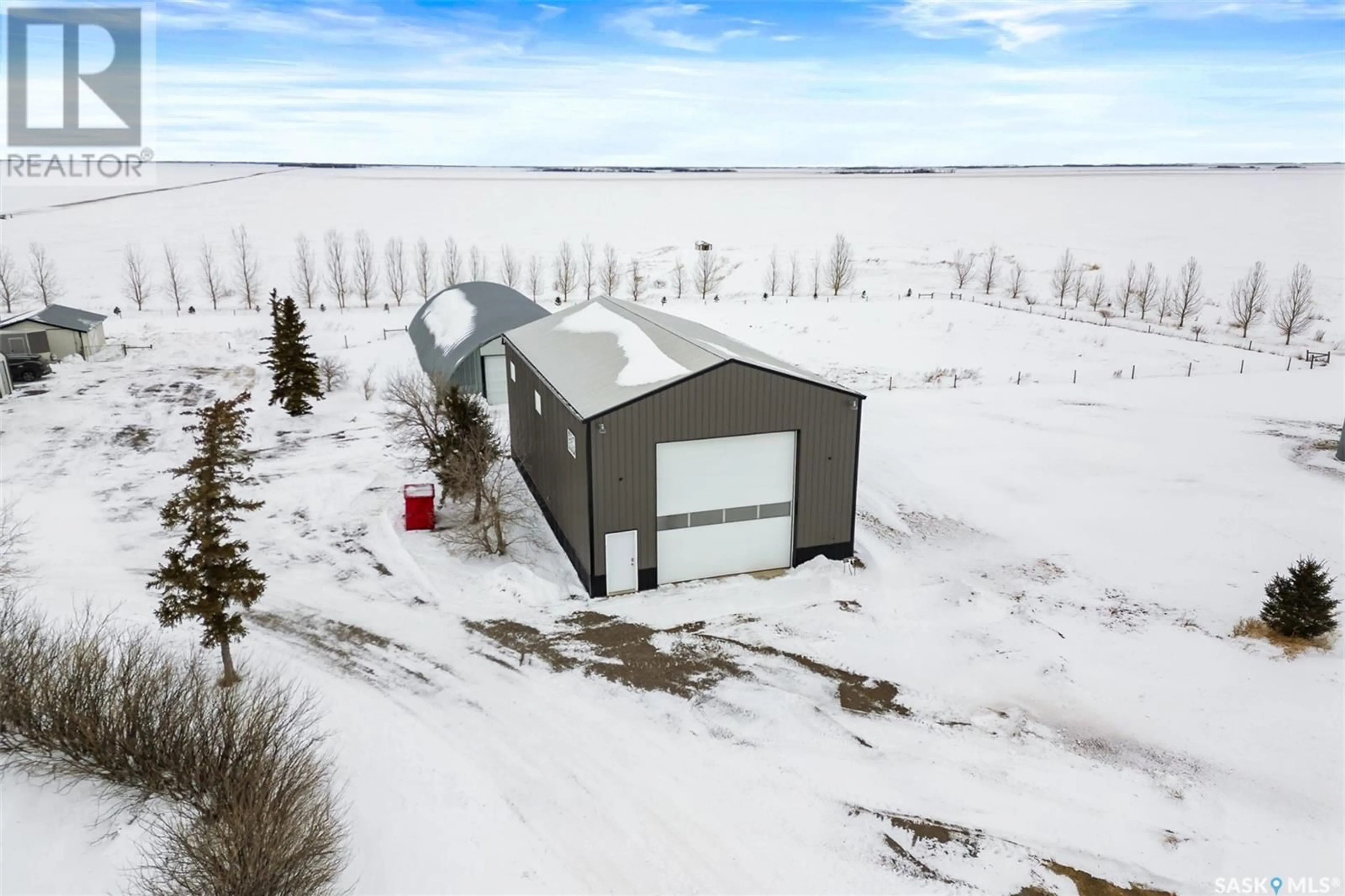 A pic from outside/outdoor area/front of a property/back of a property/a pic from drone, building for McChesney Acreage, Edenwold Rm No. 158 Saskatchewan S0G2T0