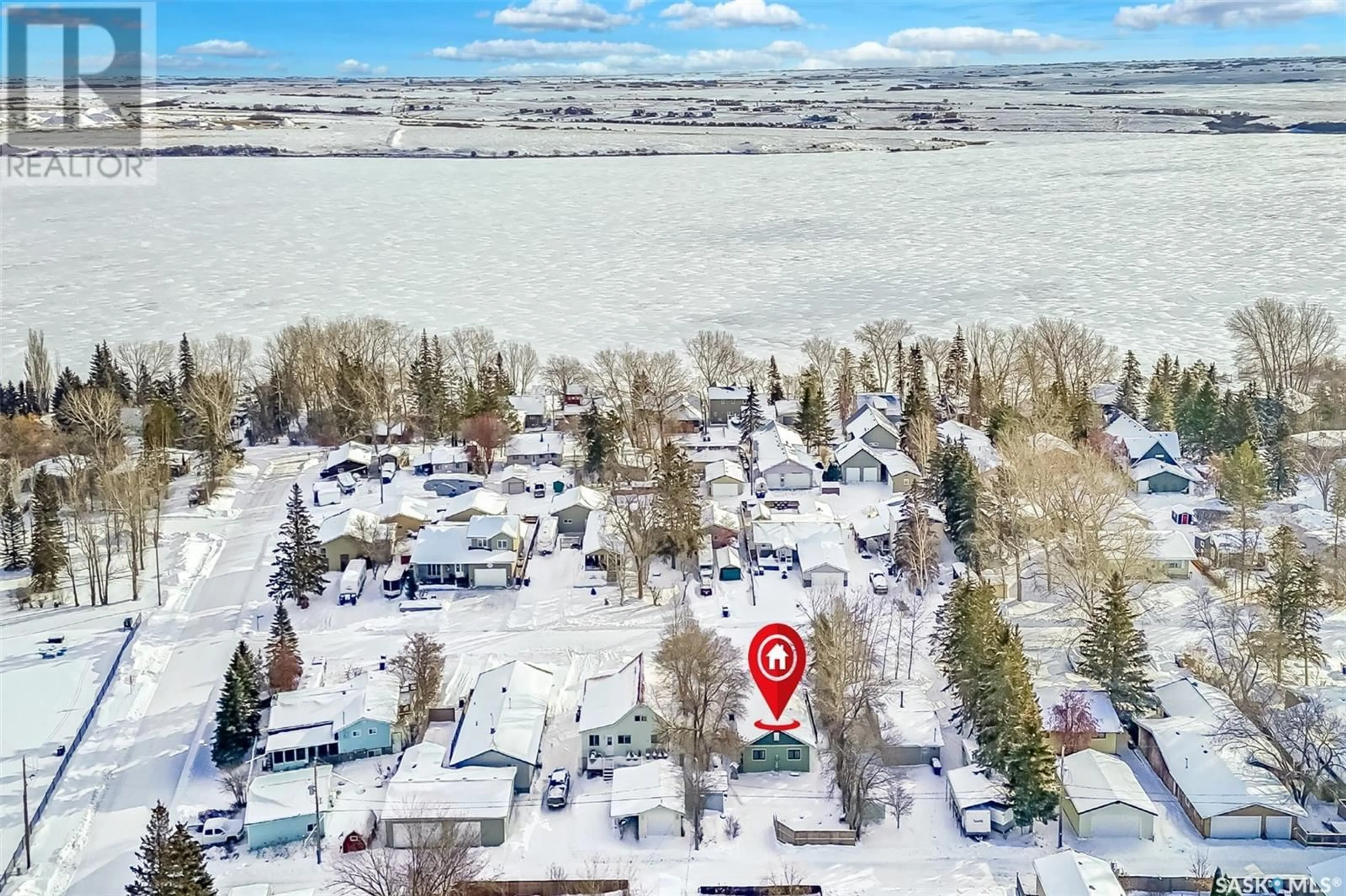 A pic from outside/outdoor area/front of a property/back of a property/a pic from drone, water/lake/river/ocean view for 8 Hordern STREET, Shields Saskatchewan S7C0A1