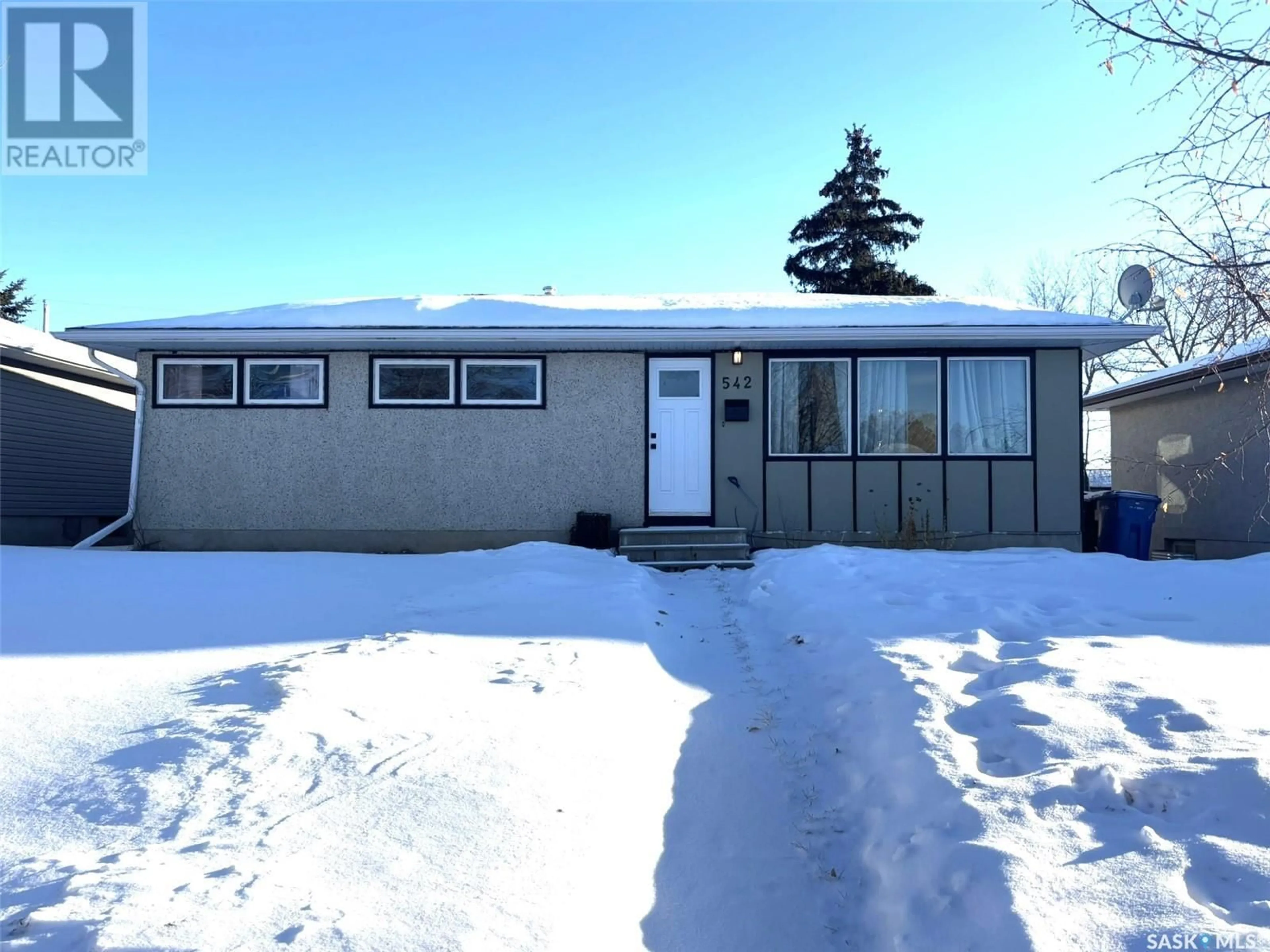 Home with vinyl exterior material, street for 542 104th STREET, North Battleford Saskatchewan S9A1M6