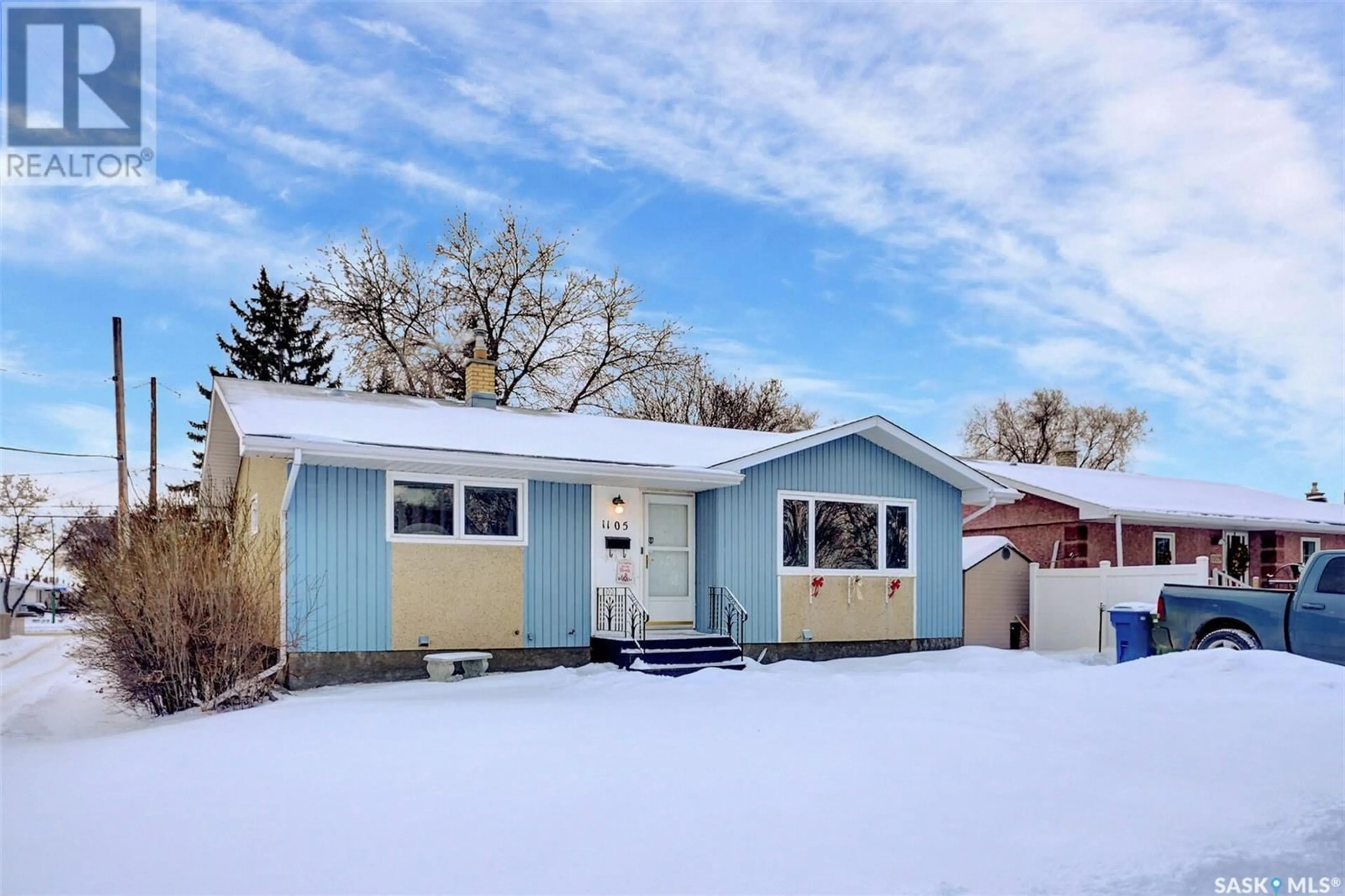 Home with vinyl exterior material, street for 1105 Dover AVENUE, Regina Saskatchewan S4R0L2