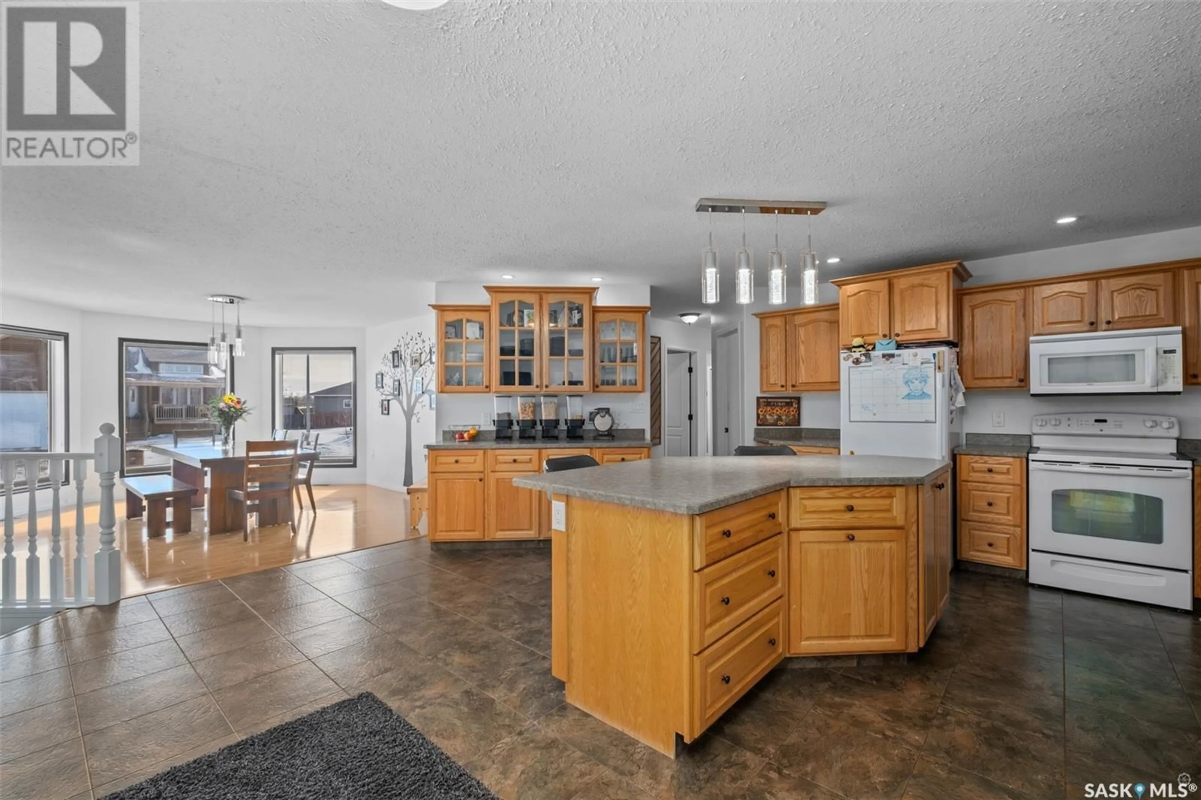 Open concept kitchen, ceramic/tile floor for 1 POPLAR CRESCENT, Birch Hills Saskatchewan S0J0G0