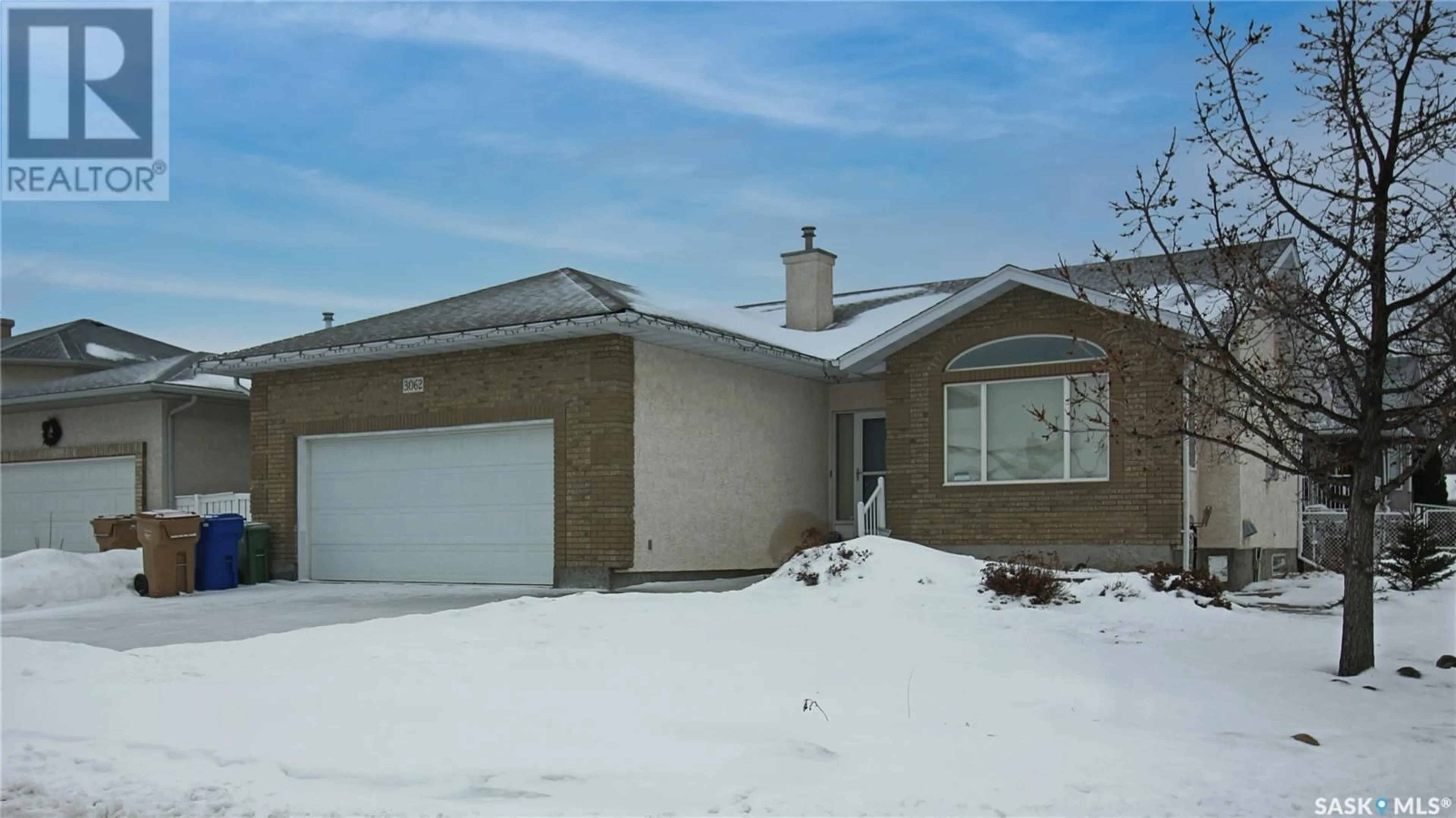 Home with brick exterior material, street for 3062 BIRCH CRESCENT, Regina Saskatchewan S4S7J3