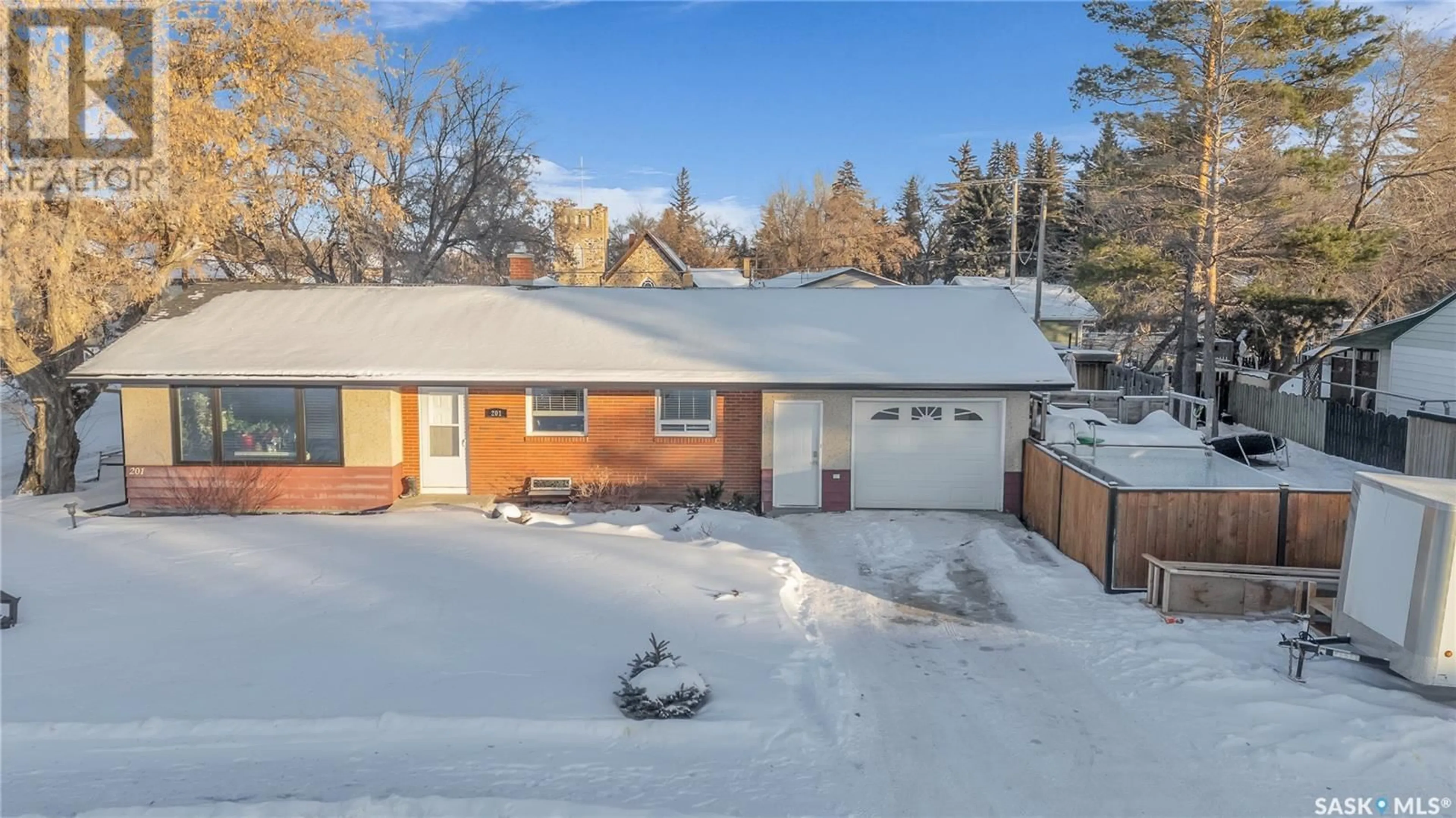 A pic from outside/outdoor area/front of a property/back of a property/a pic from drone, street for 201 Hudson AVENUE, Fort Qu'Appelle Saskatchewan S0G1S0