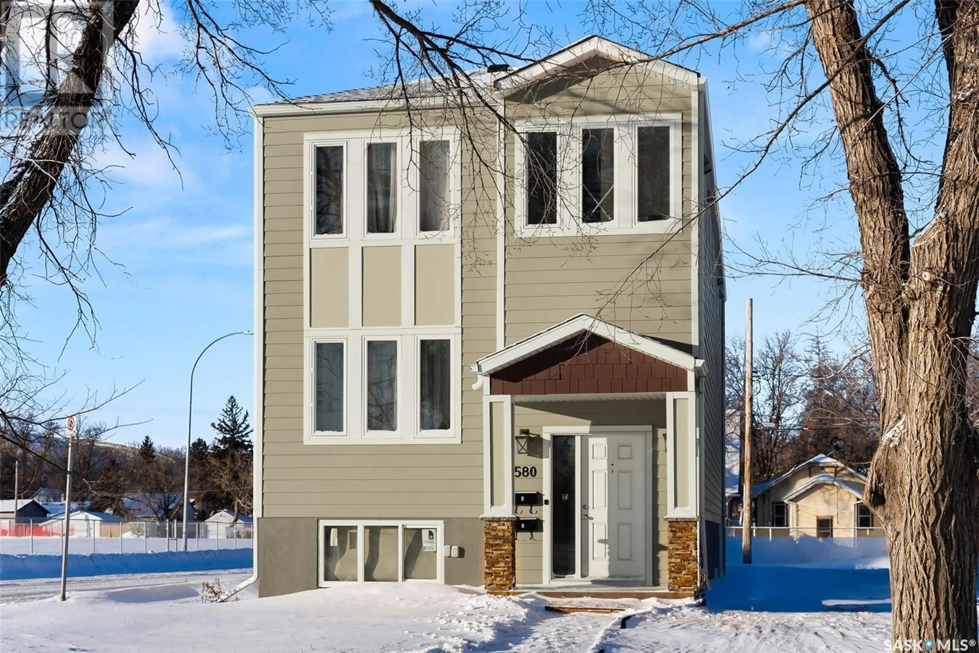 Home with brick exterior material, street for A 1580 Robinson STREET, Regina Saskatchewan S4T2N8