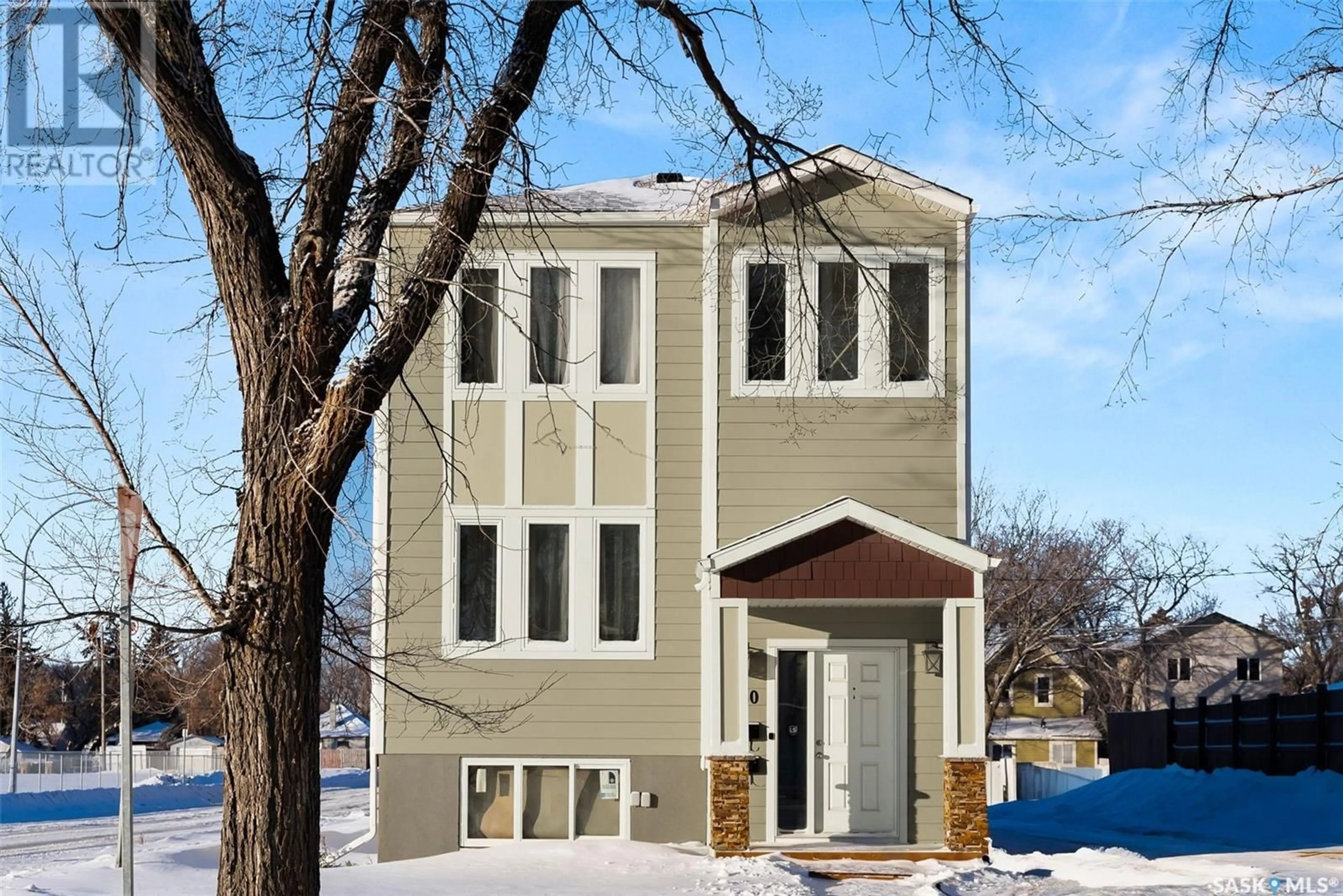 Home with brick exterior material, street for A 1580 Robinson STREET, Regina Saskatchewan S4T2N8