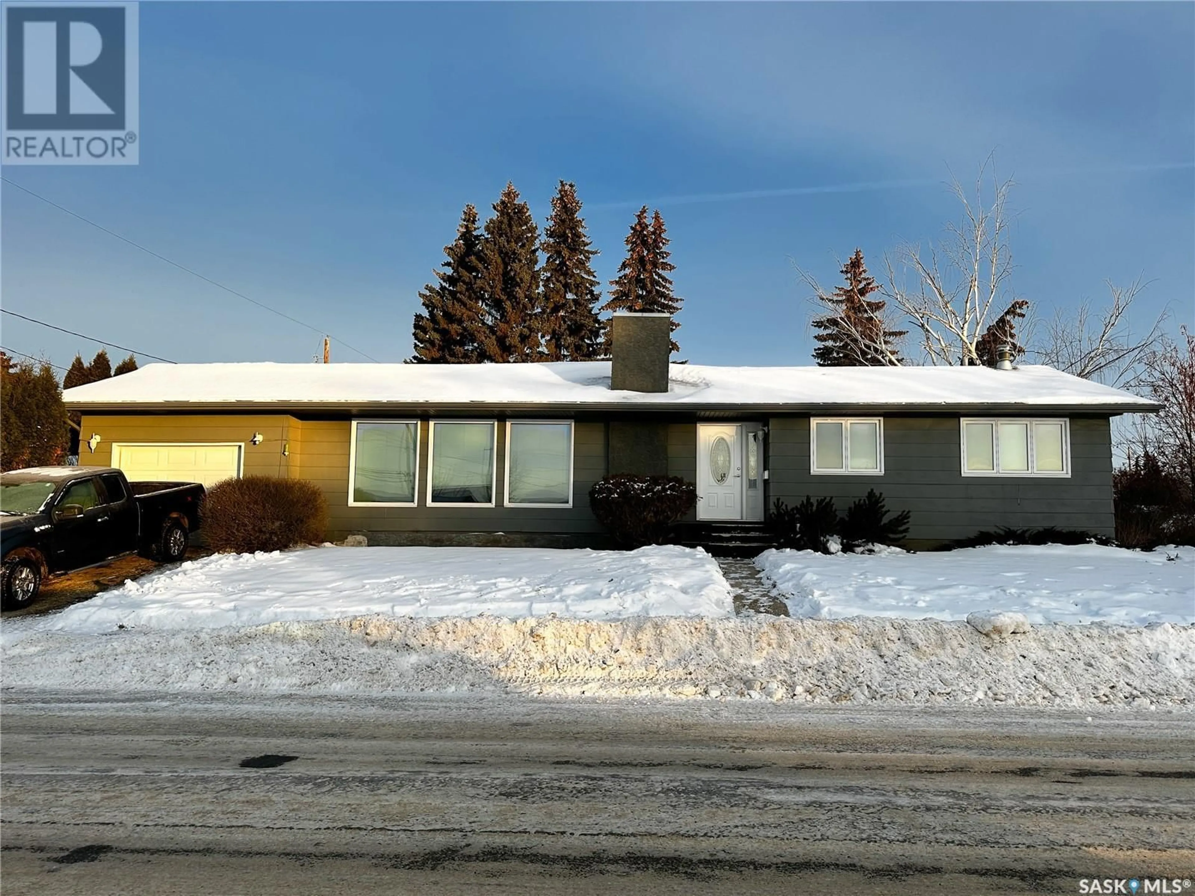 Home with vinyl exterior material, street for 1501 92nd STREET, North Battleford Saskatchewan S9A0B2