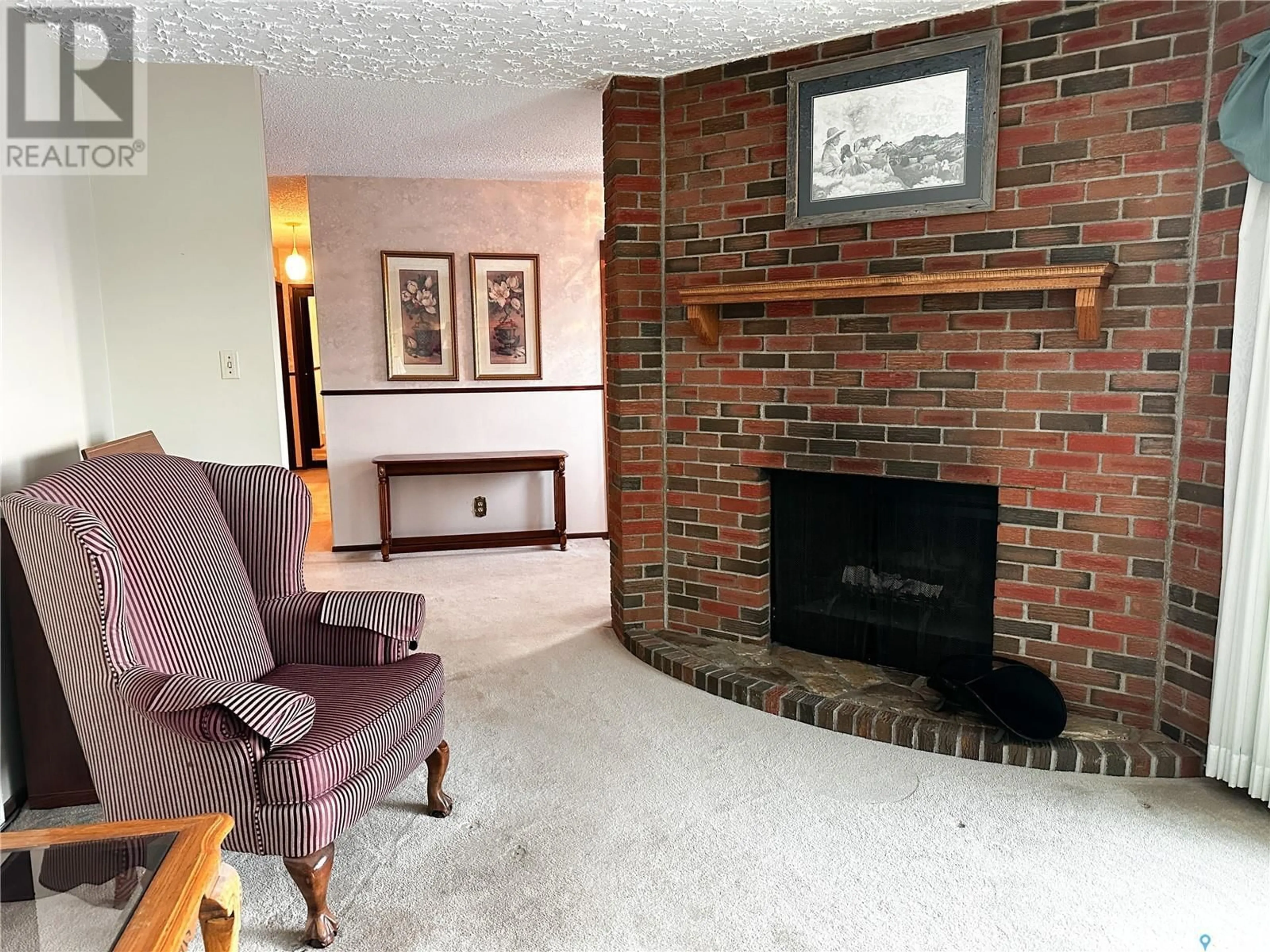 Living room with furniture, unknown for 1501 92nd STREET, North Battleford Saskatchewan S9A0B2