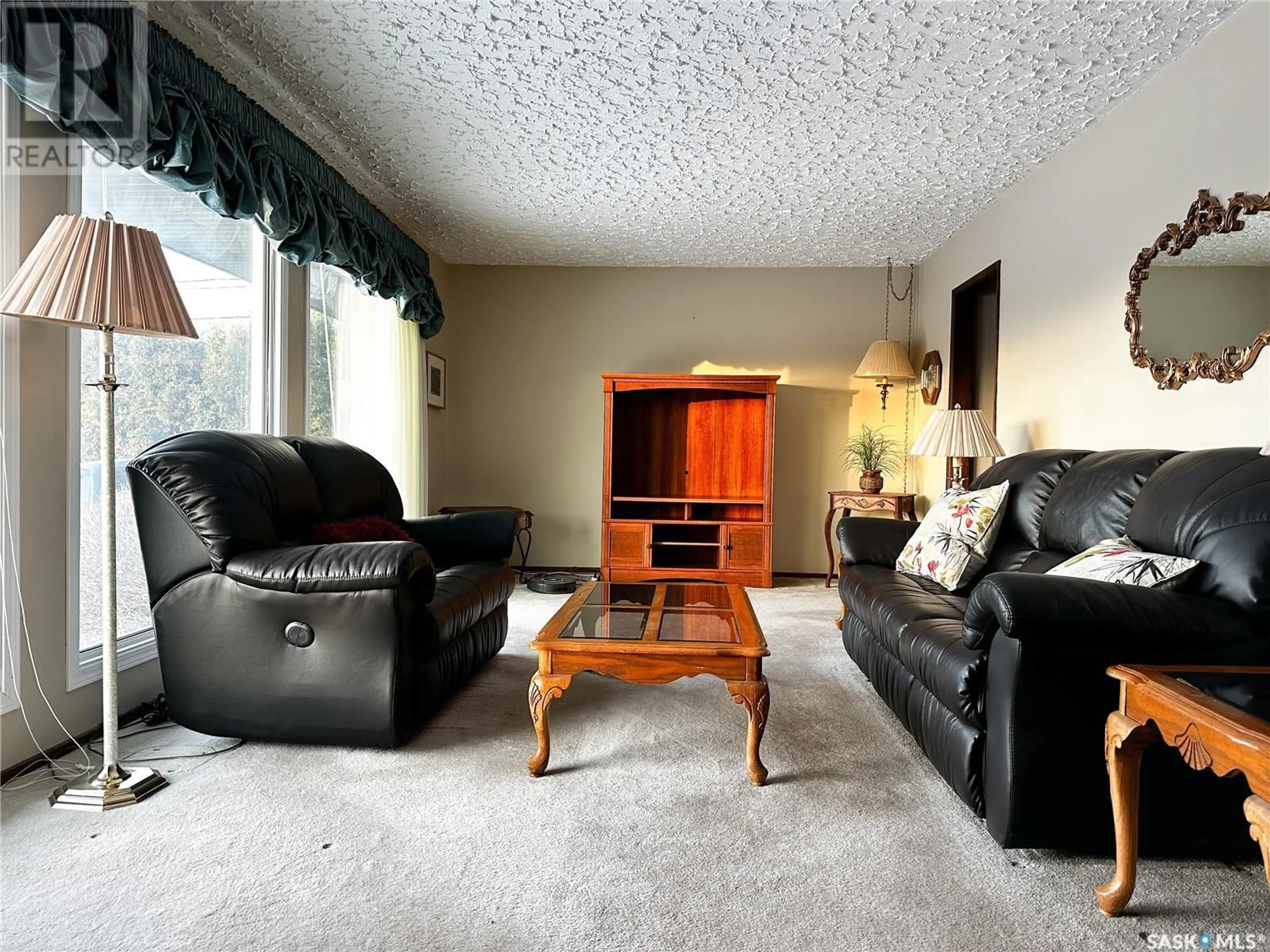 Living room with furniture, unknown for 1501 92nd STREET, North Battleford Saskatchewan S9A0B2