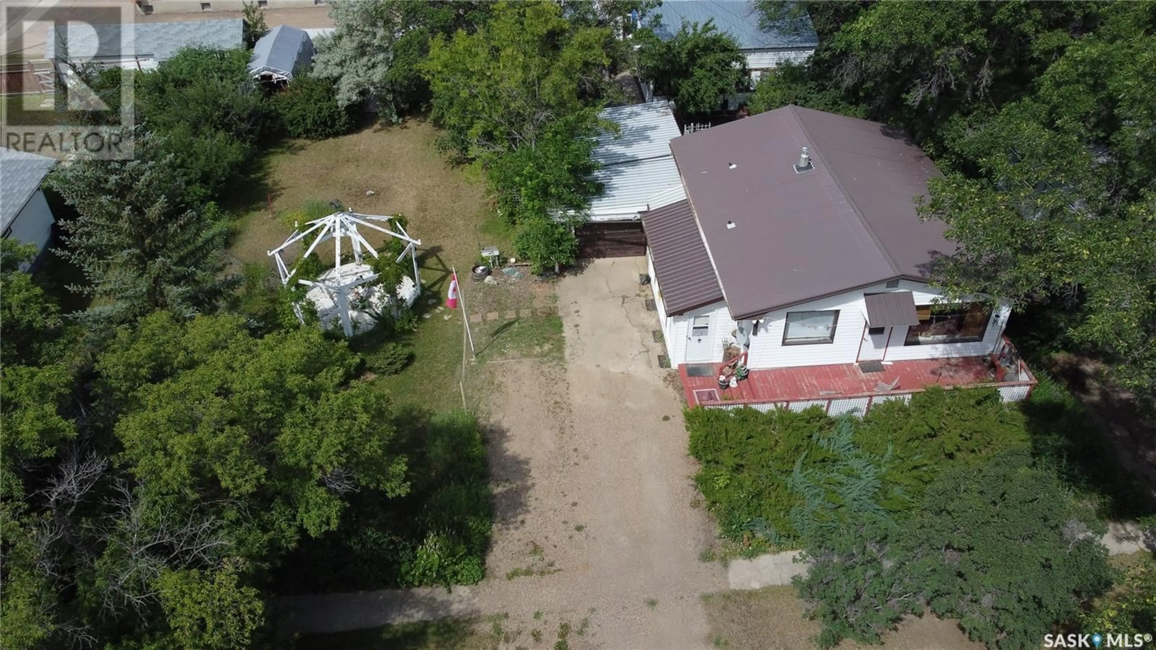 A pic from outside/outdoor area/front of a property/back of a property/a pic from drone, street for 312 Brownlee STREET, Herbert Saskatchewan S0H2A0