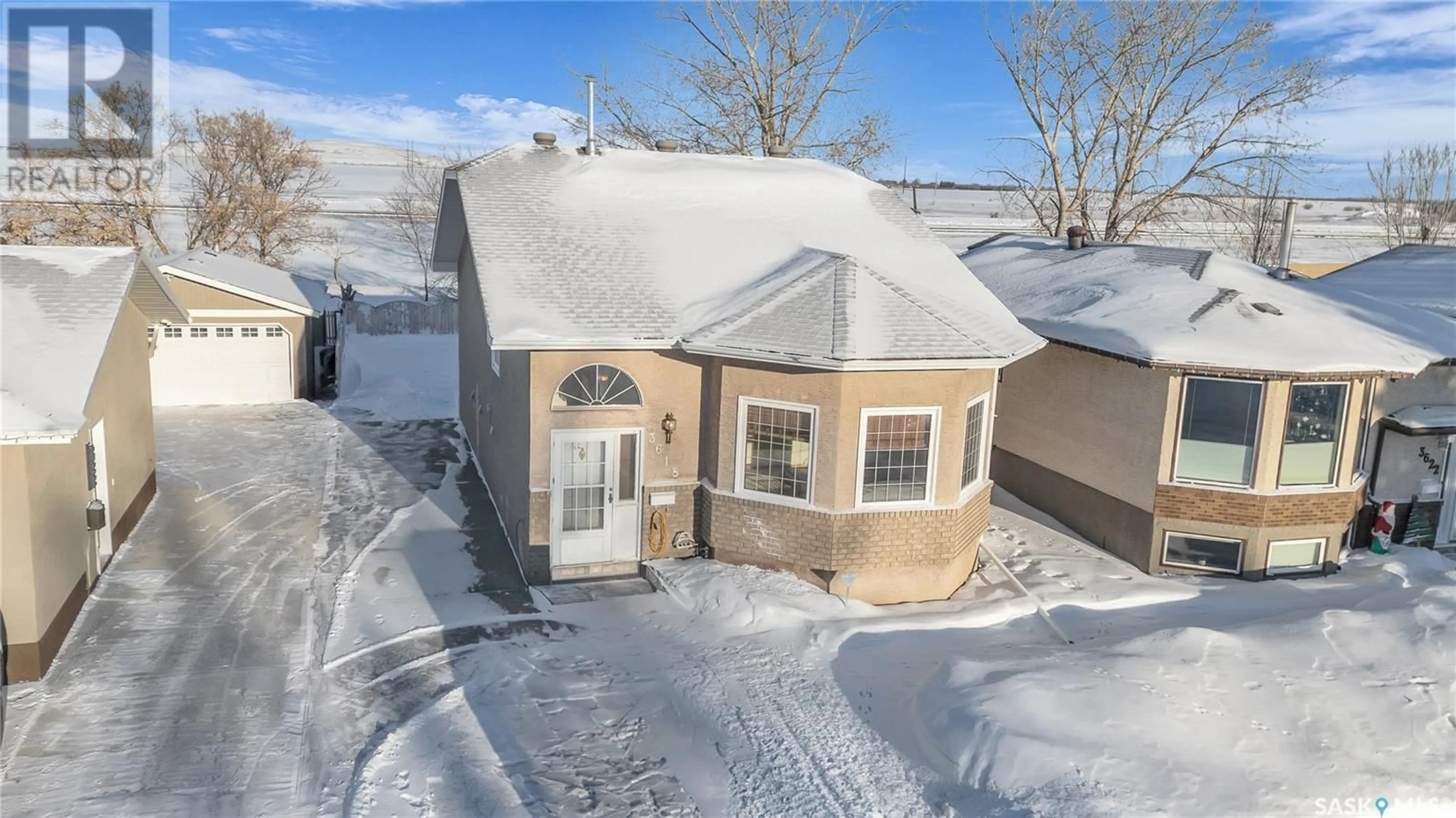 A pic from outside/outdoor area/front of a property/back of a property/a pic from drone, street for 3618 Cormorant DRIVE E, Regina Saskatchewan S4N7G2