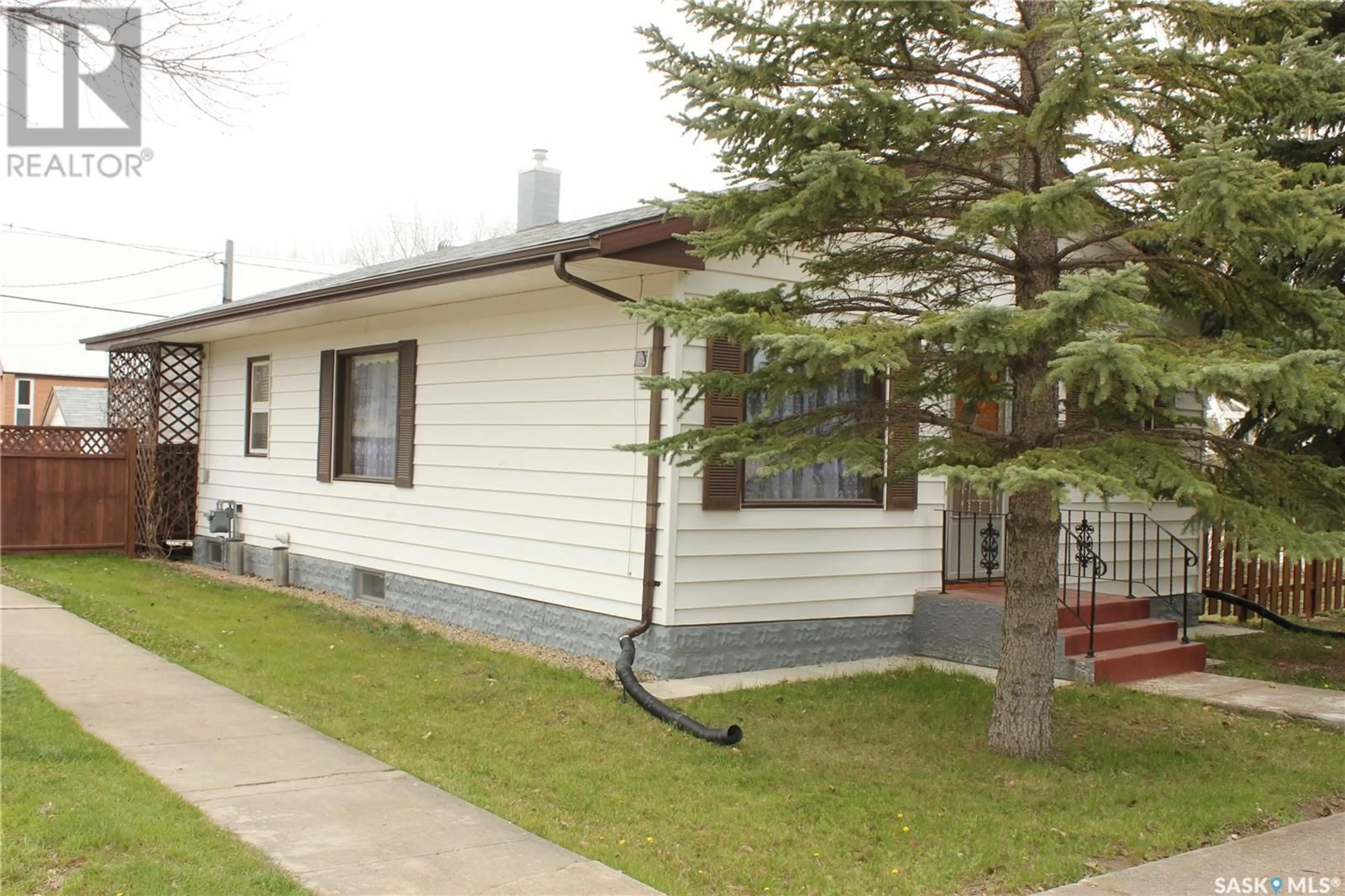 Home with vinyl exterior material, street for 304 Brownlee STREET, Herbert Saskatchewan S0H2A0