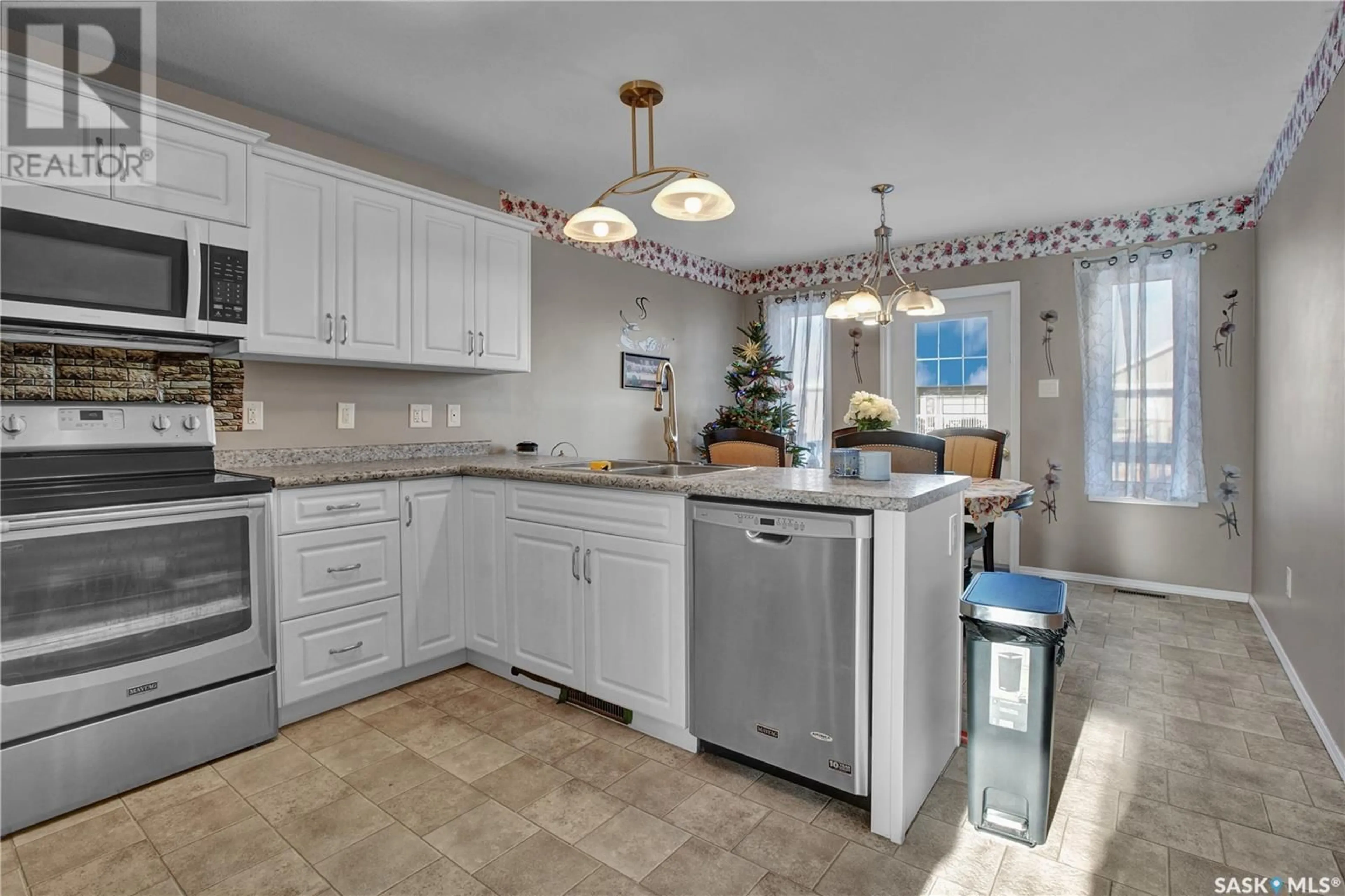 Open concept kitchen, ceramic/tile floor for 316 Haichert STREET, Warman Saskatchewan S0K4S0