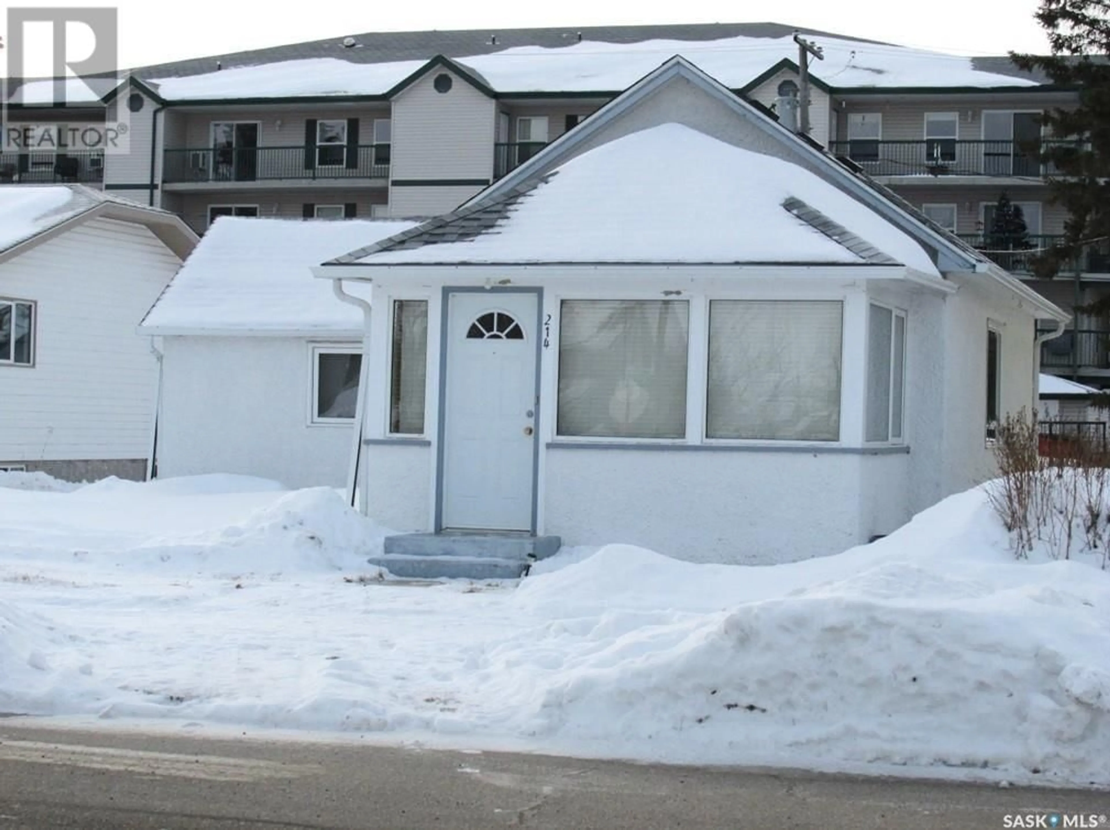 A pic from outside/outdoor area/front of a property/back of a property/a pic from drone, street for 214 2ND STREET, Nipawin Saskatchewan S0E1E0