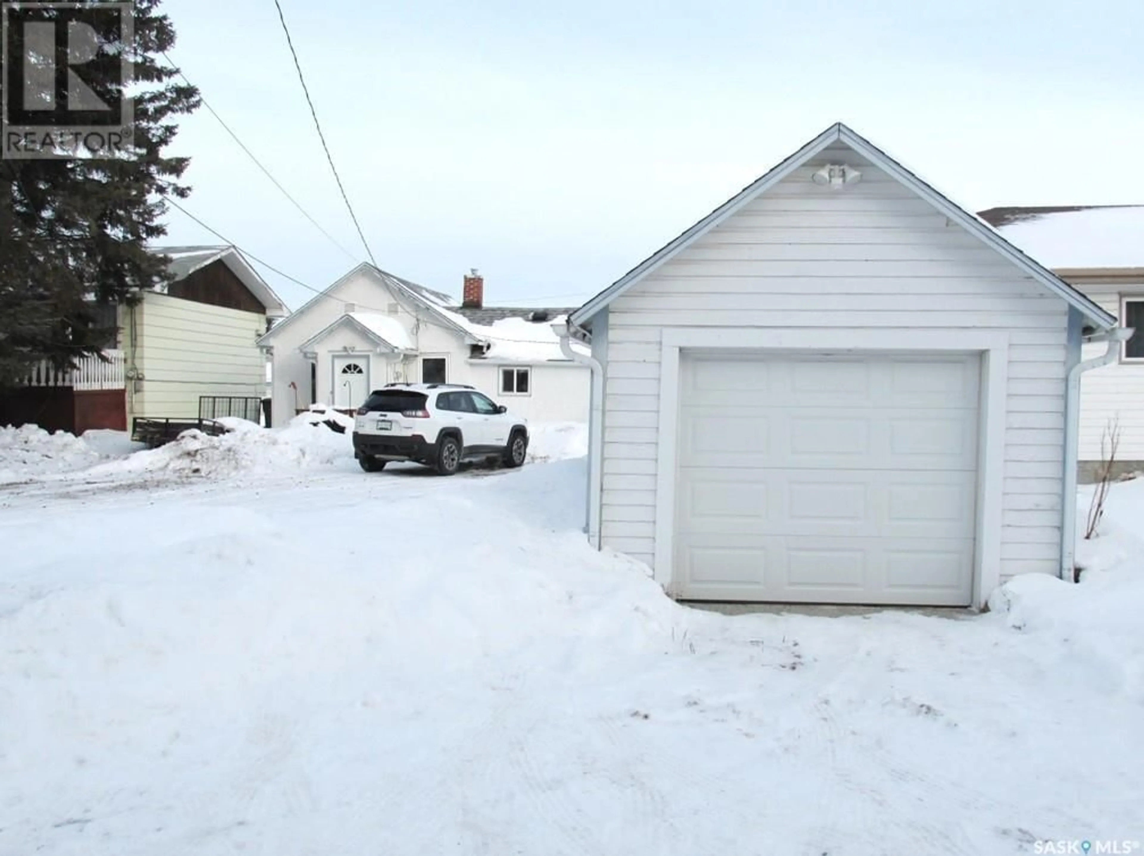 A pic from outside/outdoor area/front of a property/back of a property/a pic from drone, street for 214 2ND STREET, Nipawin Saskatchewan S0E1E0