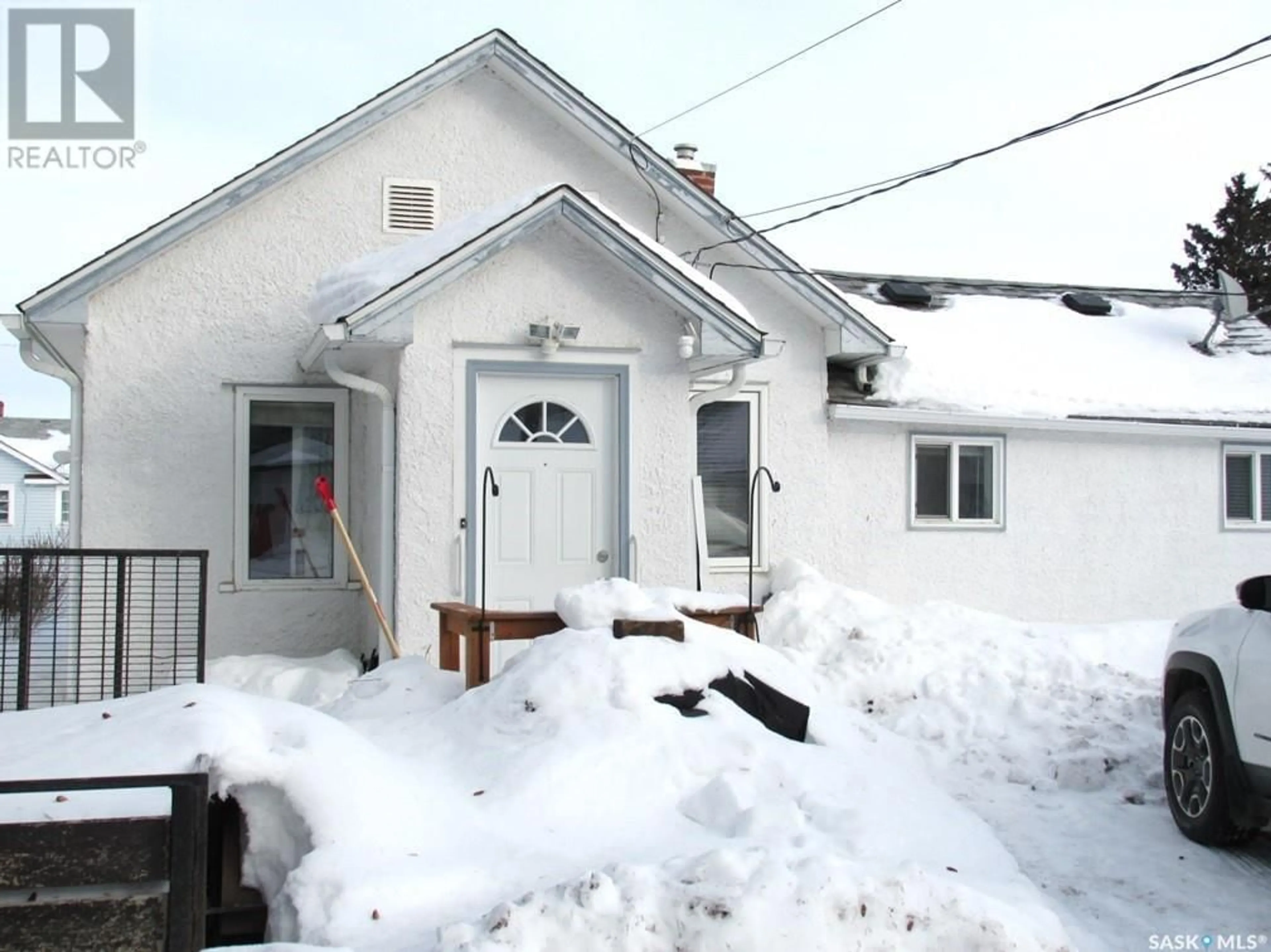 A pic from outside/outdoor area/front of a property/back of a property/a pic from drone, street for 214 2ND STREET, Nipawin Saskatchewan S0E1E0