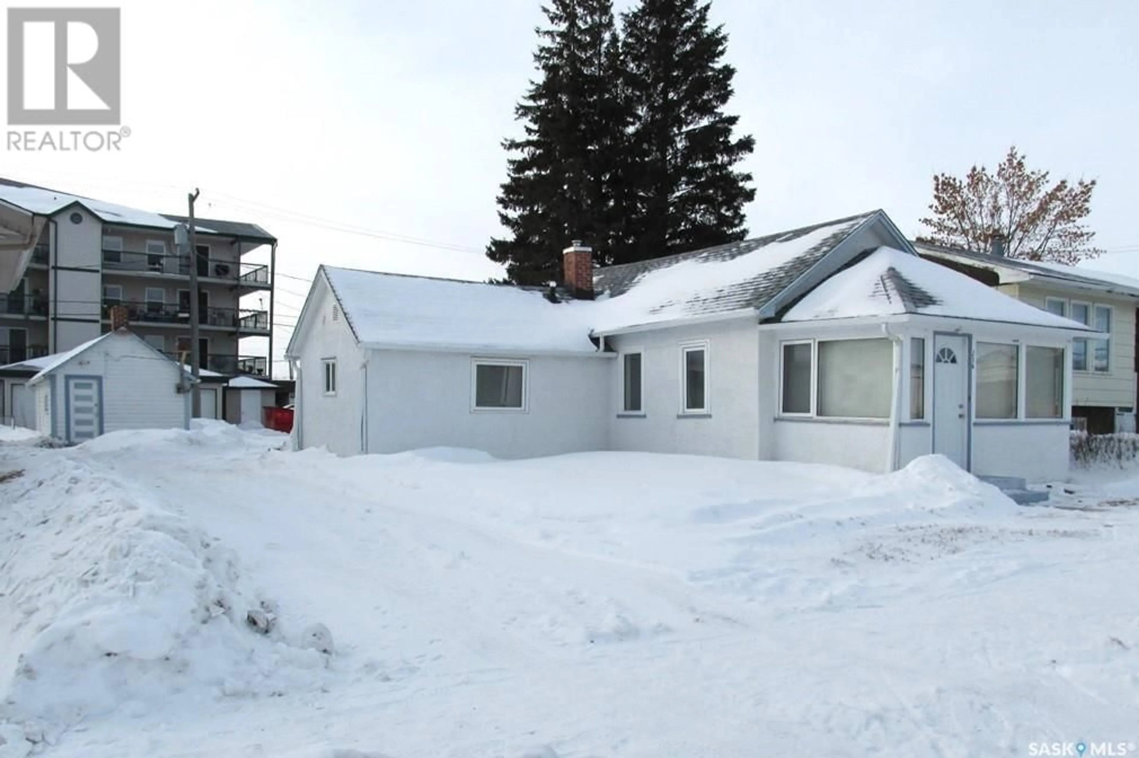 A pic from outside/outdoor area/front of a property/back of a property/a pic from drone, building for 214 2nd STREET E, Nipawin Saskatchewan S0E1E0