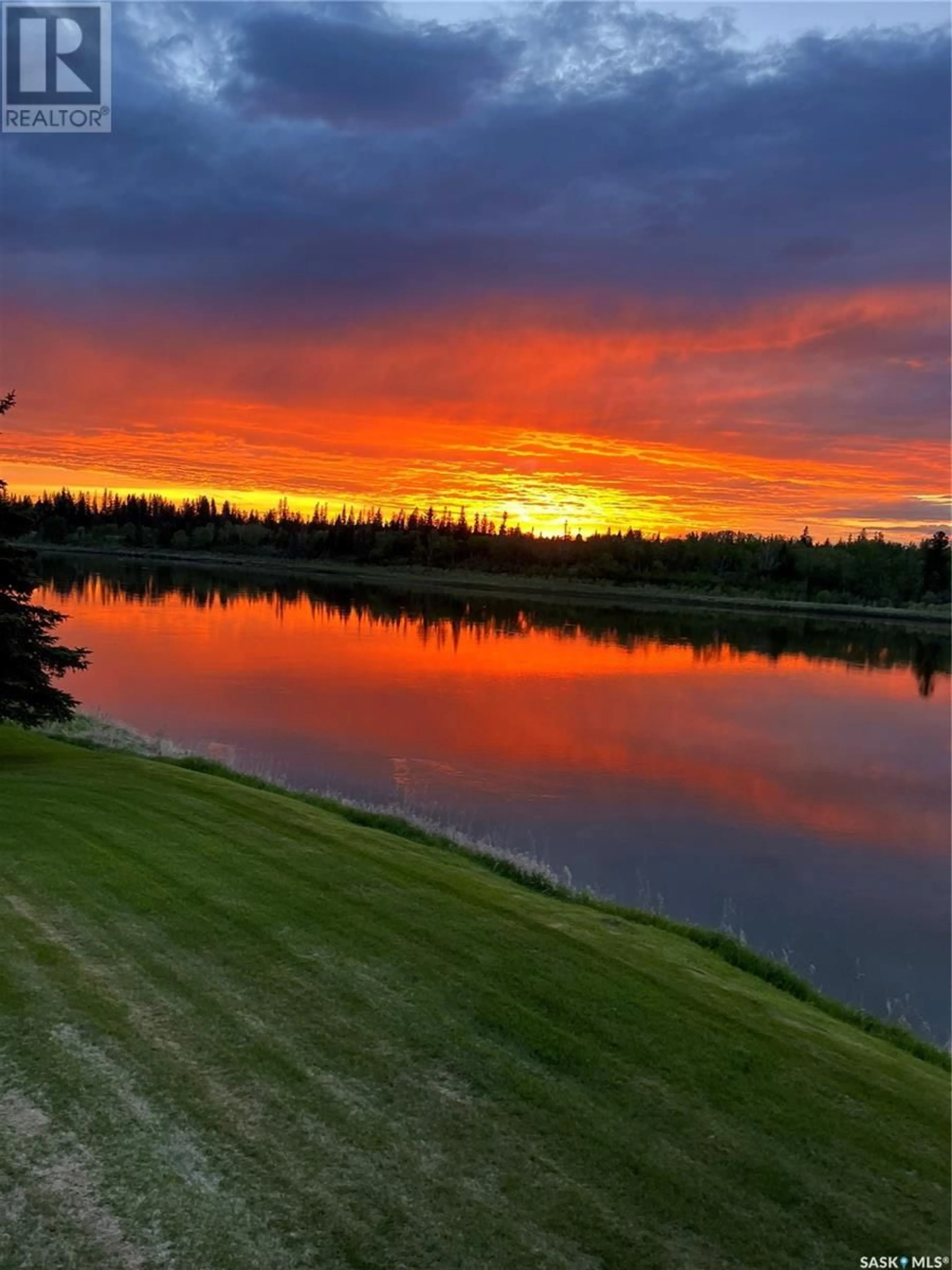 A pic from outside/outdoor area/front of a property/back of a property/a pic from drone, water/lake/river/ocean view for 2C 516 River STREET E, Prince Albert Saskatchewan S6V0A6