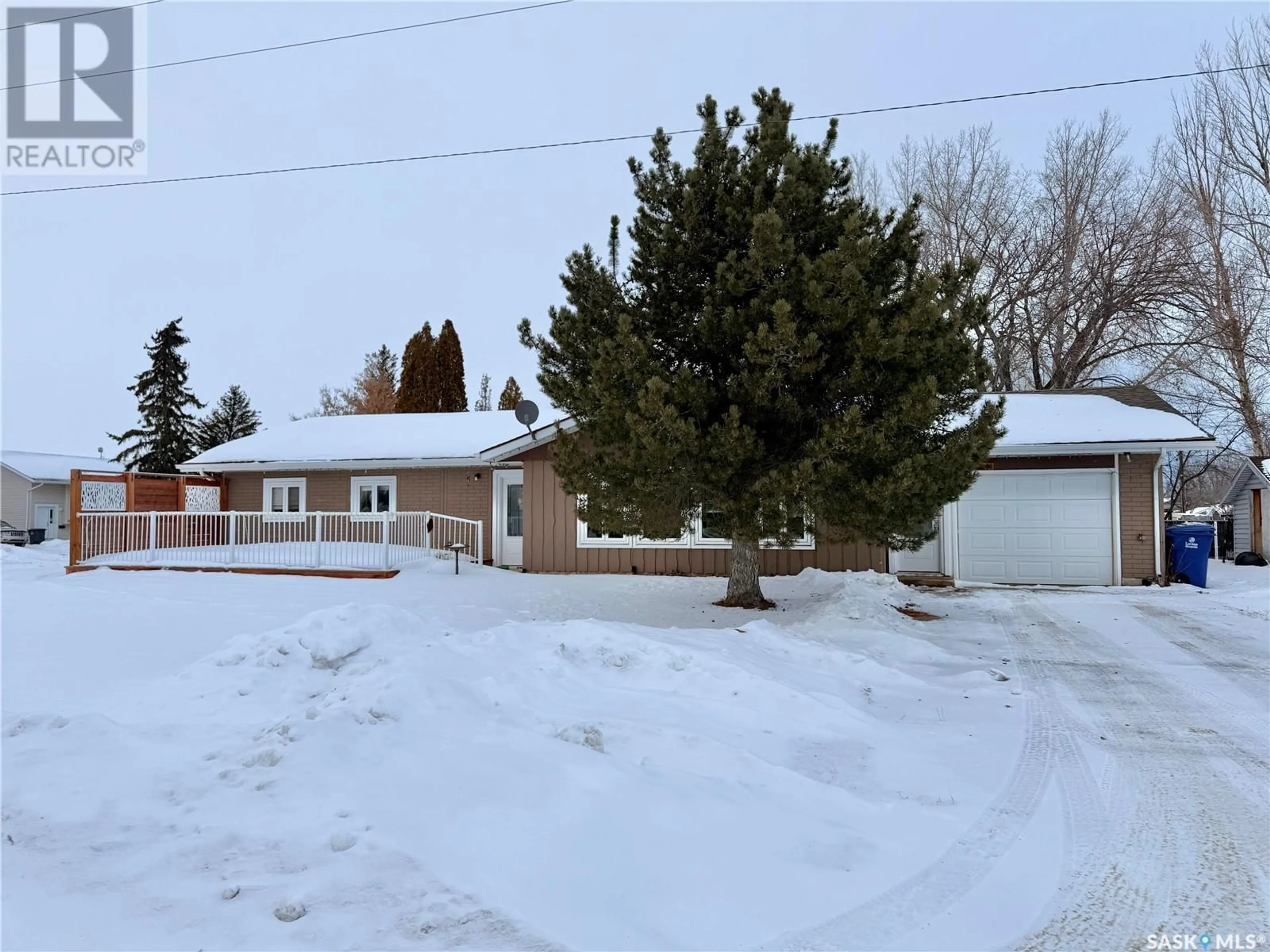 A pic from outside/outdoor area/front of a property/back of a property/a pic from drone, street for 203 Cross STREET N, Outlook Saskatchewan S0L2N0