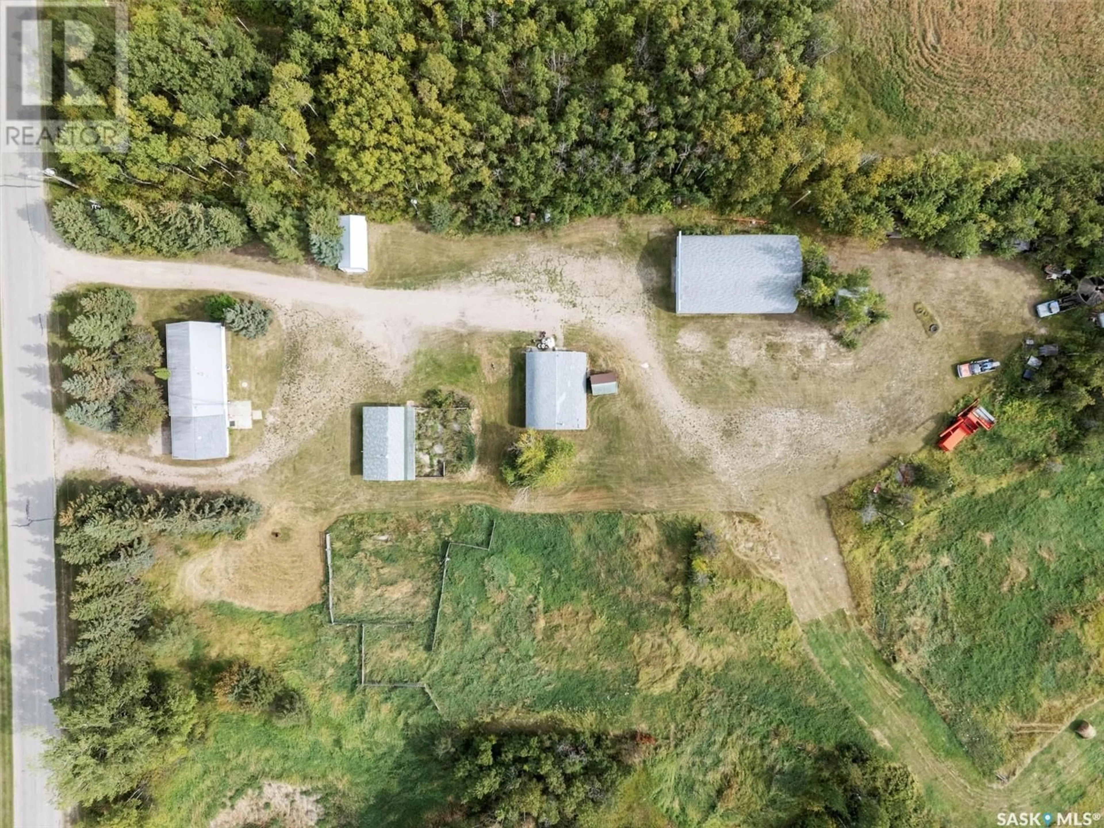 A pic from outside/outdoor area/front of a property/back of a property/a pic from drone, forest/trees view for Rural Address- Middle lake Acreage, Middle Lake Saskatchewan S0K2X0