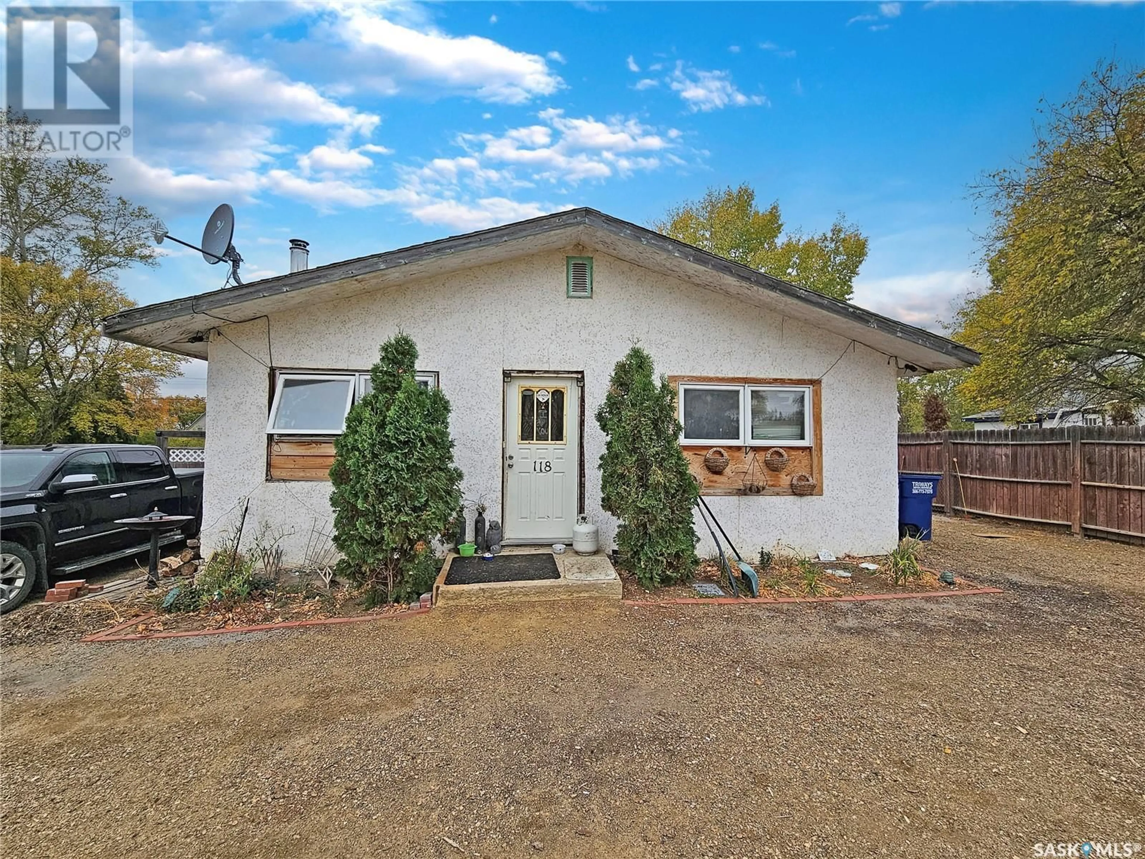 Home with vinyl exterior material, street for 118 Warwick STREET, Neville Saskatchewan S0N1T0