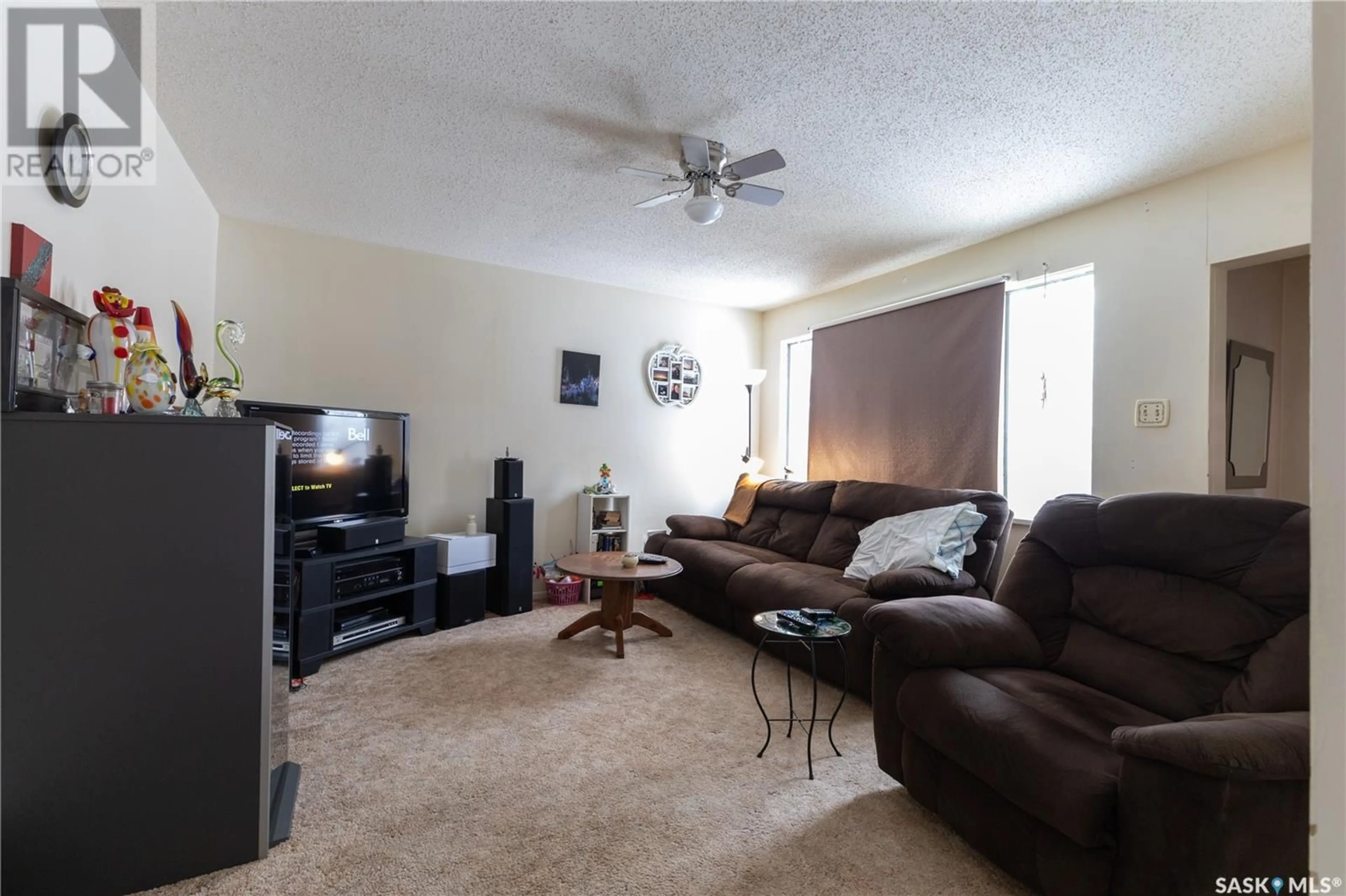 Living room with furniture, unknown for 111 Government ROAD, Dundurn Saskatchewan S0K1K0