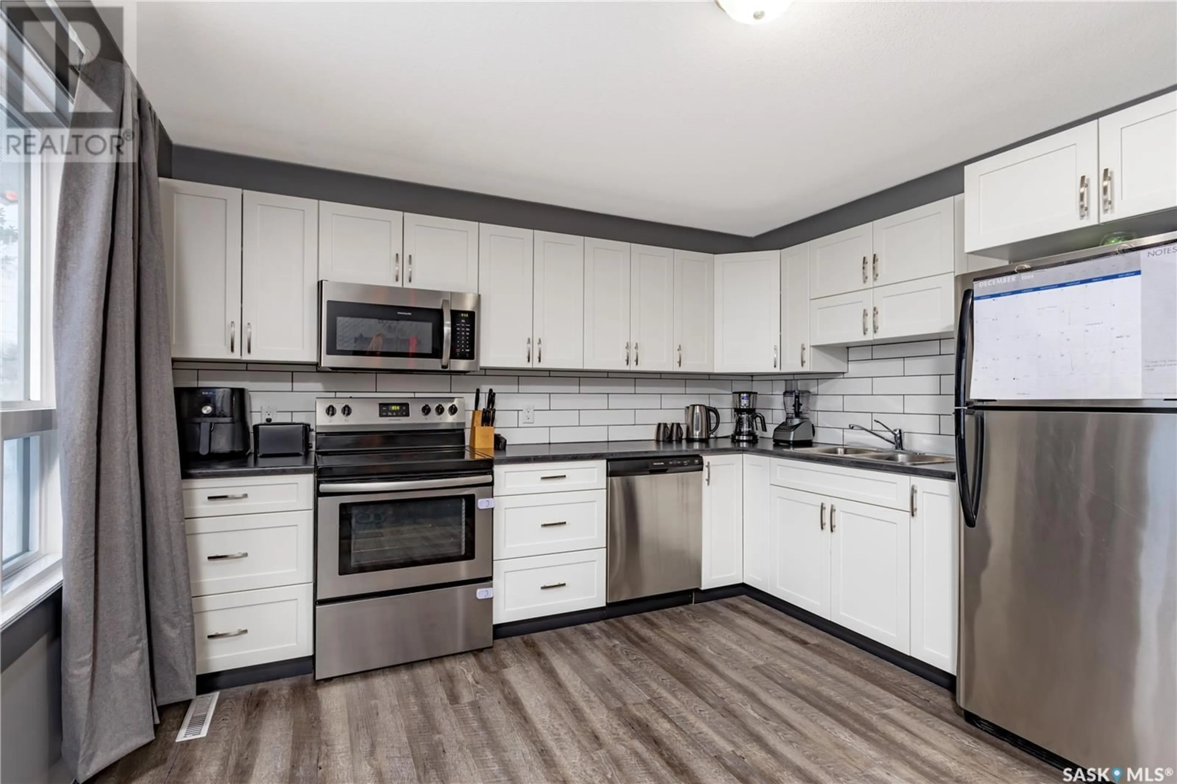 Open concept kitchen, unknown for 104 Matilda STREET, Melfort Saskatchewan S0E1A0