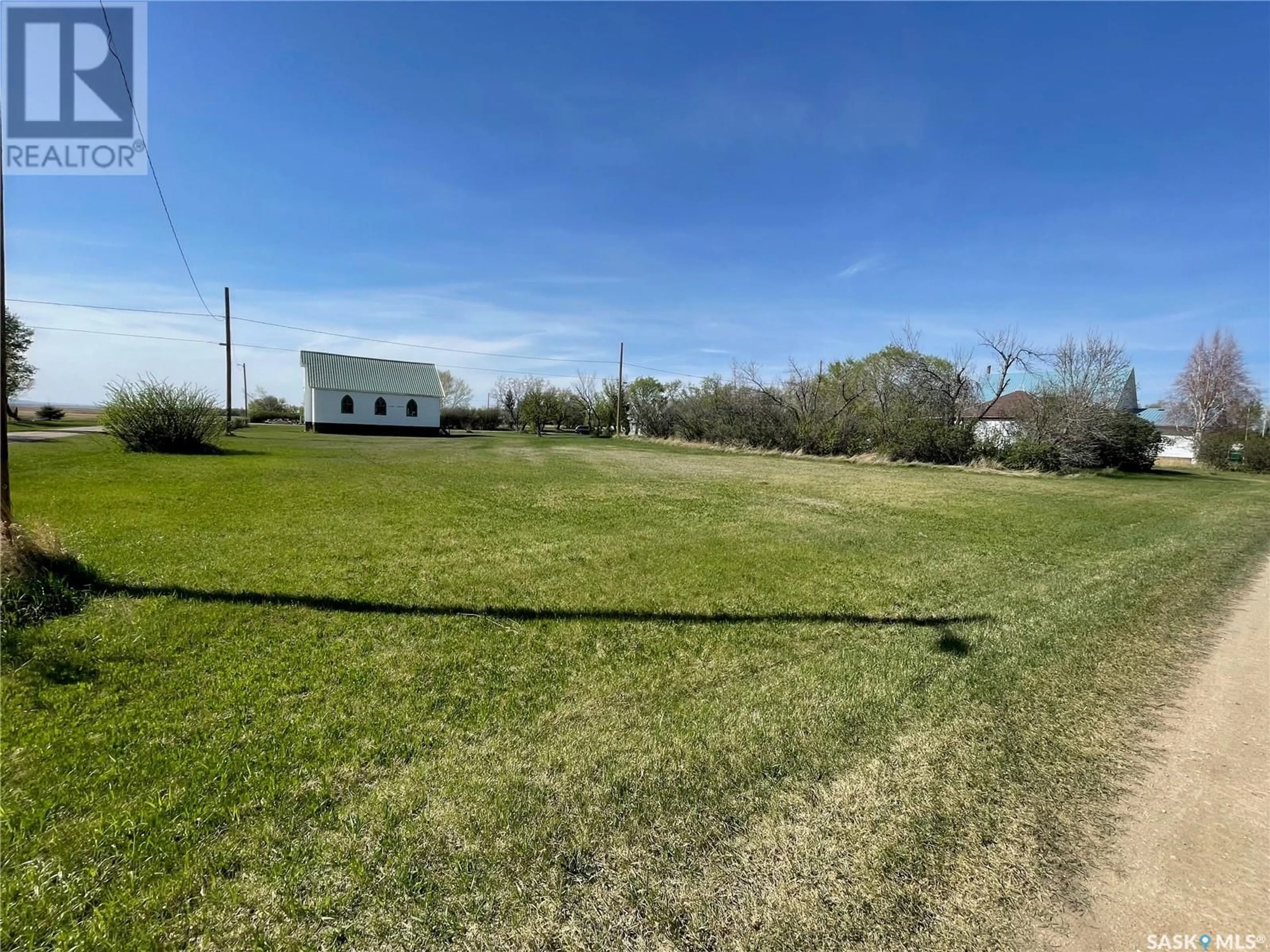 A pic from outside/outdoor area/front of a property/back of a property/a pic from drone, unknown for 16 ELM STREET, Ruddell Saskatchewan S0M2S0