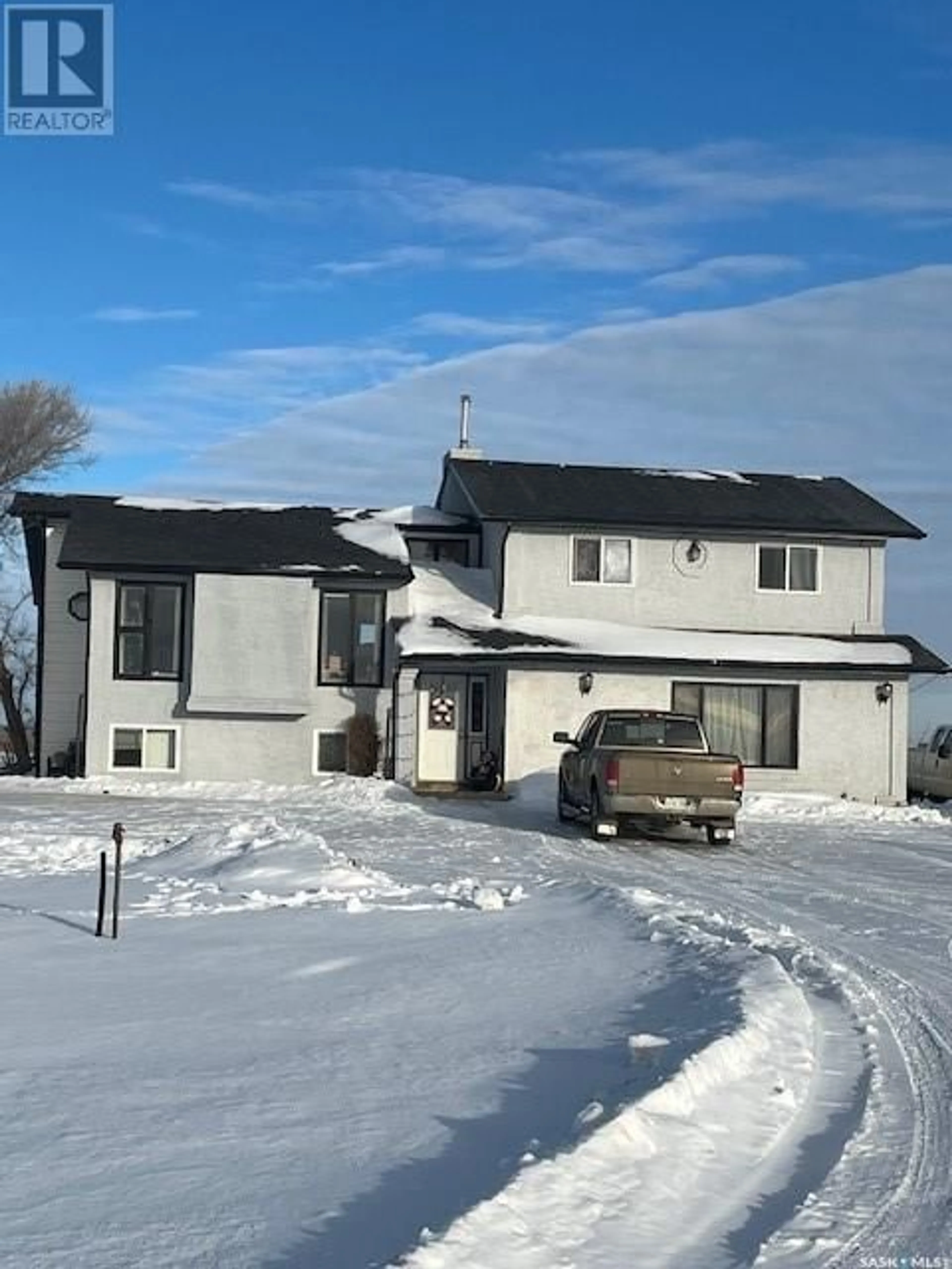 A pic from outside/outdoor area/front of a property/back of a property/a pic from drone, street for Ross Acreage, Corman Park Rm No. 344 Saskatchewan S7K3J5