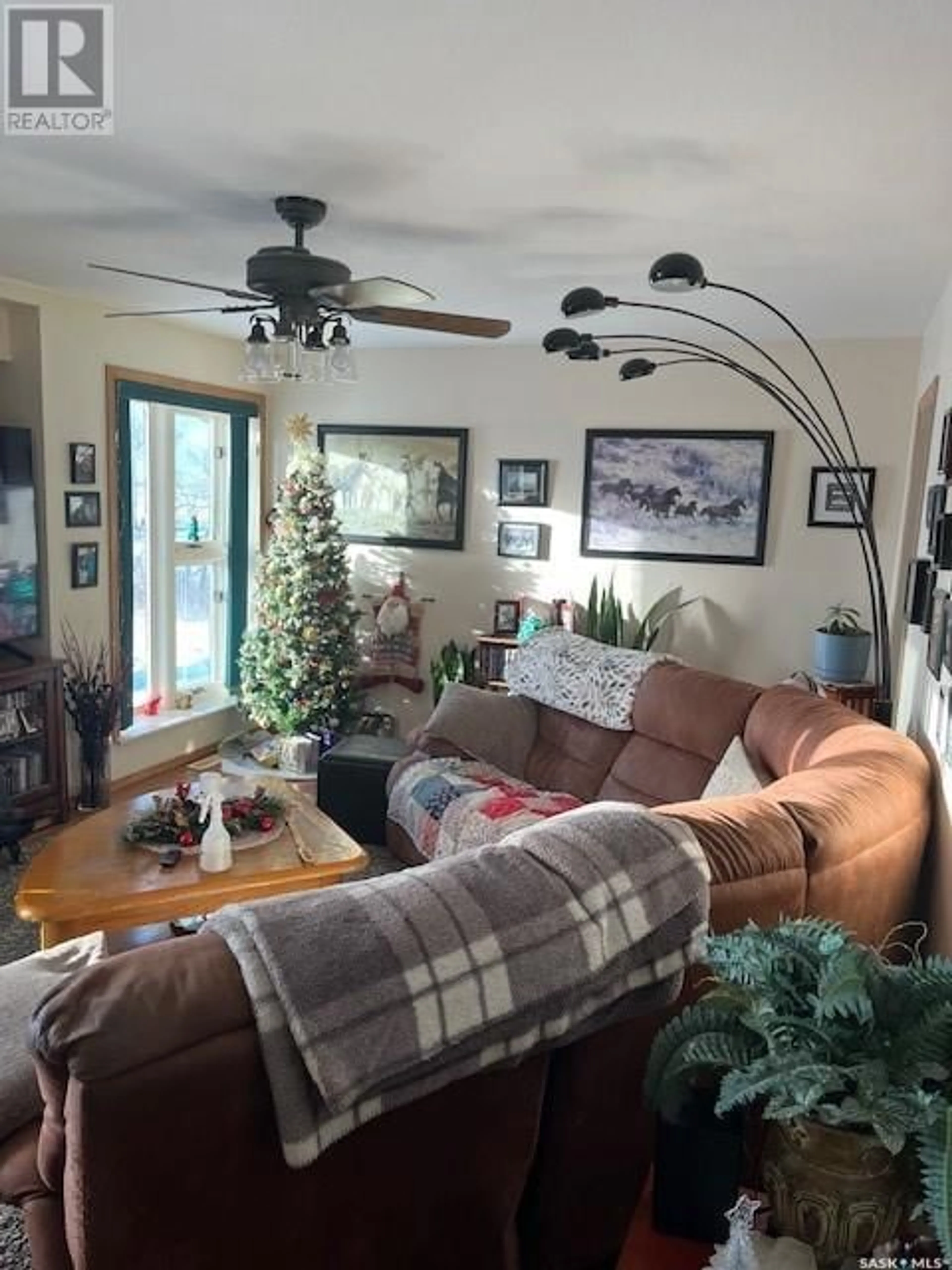 Living room with furniture, unknown for Ross Acreage, Corman Park Rm No. 344 Saskatchewan S7K3J5