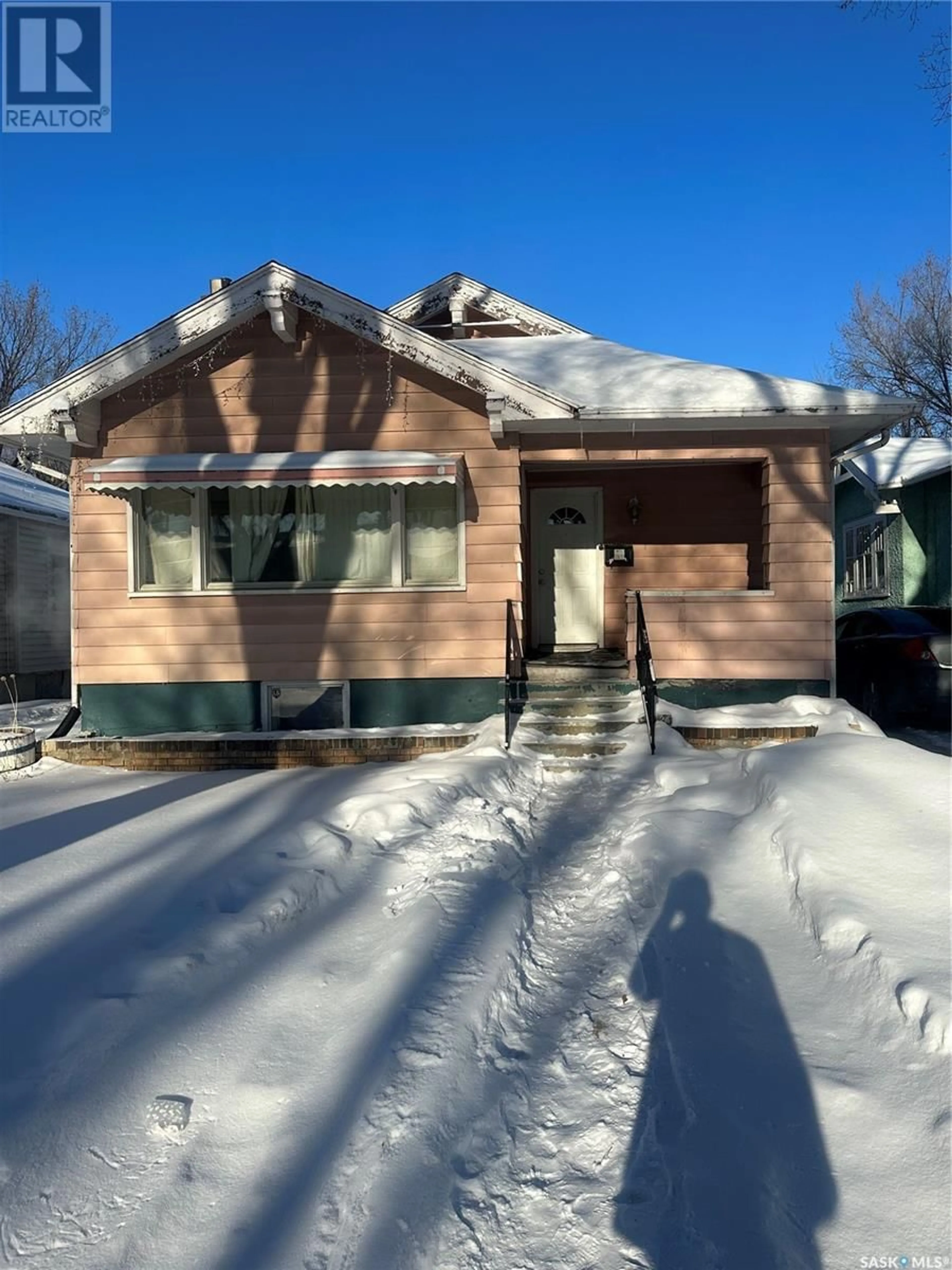 Home with vinyl exterior material, street for 3520 Dewdney AVENUE, Regina Saskatchewan S4T0Z3