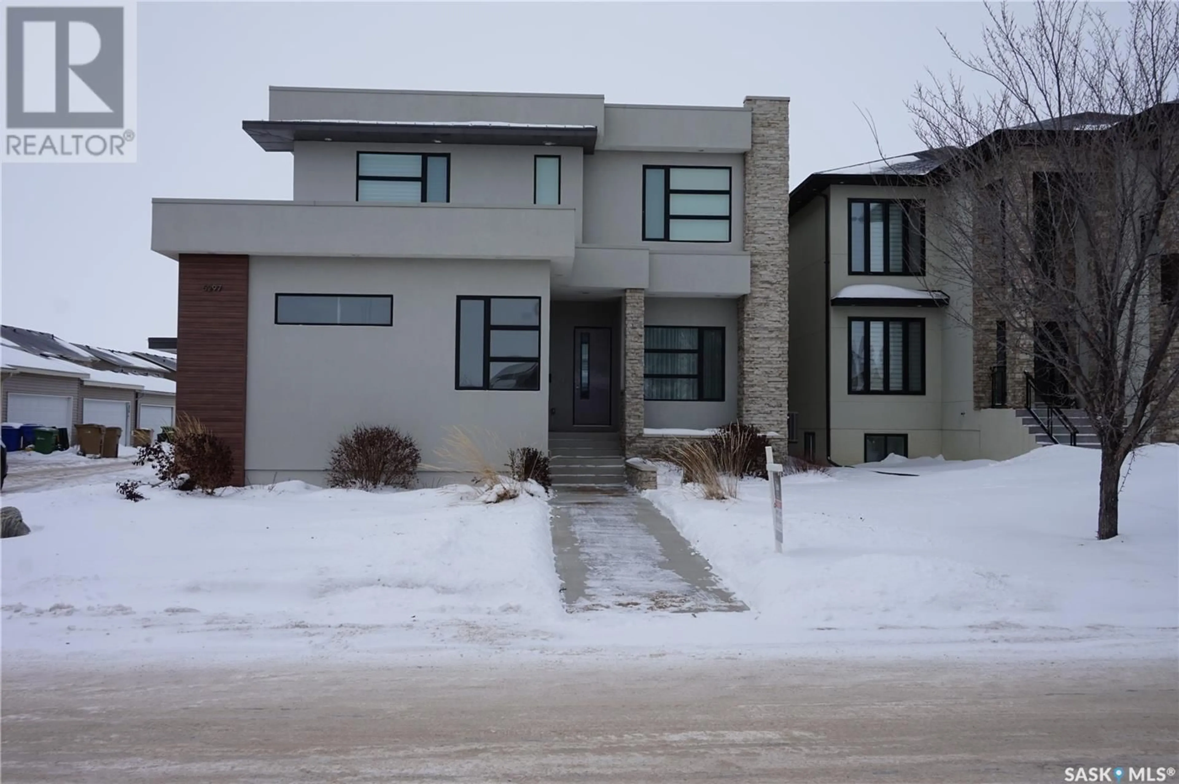 Home with brick exterior material, street for 5297 Aviator CRESCENT, Regina Saskatchewan S4W0G9