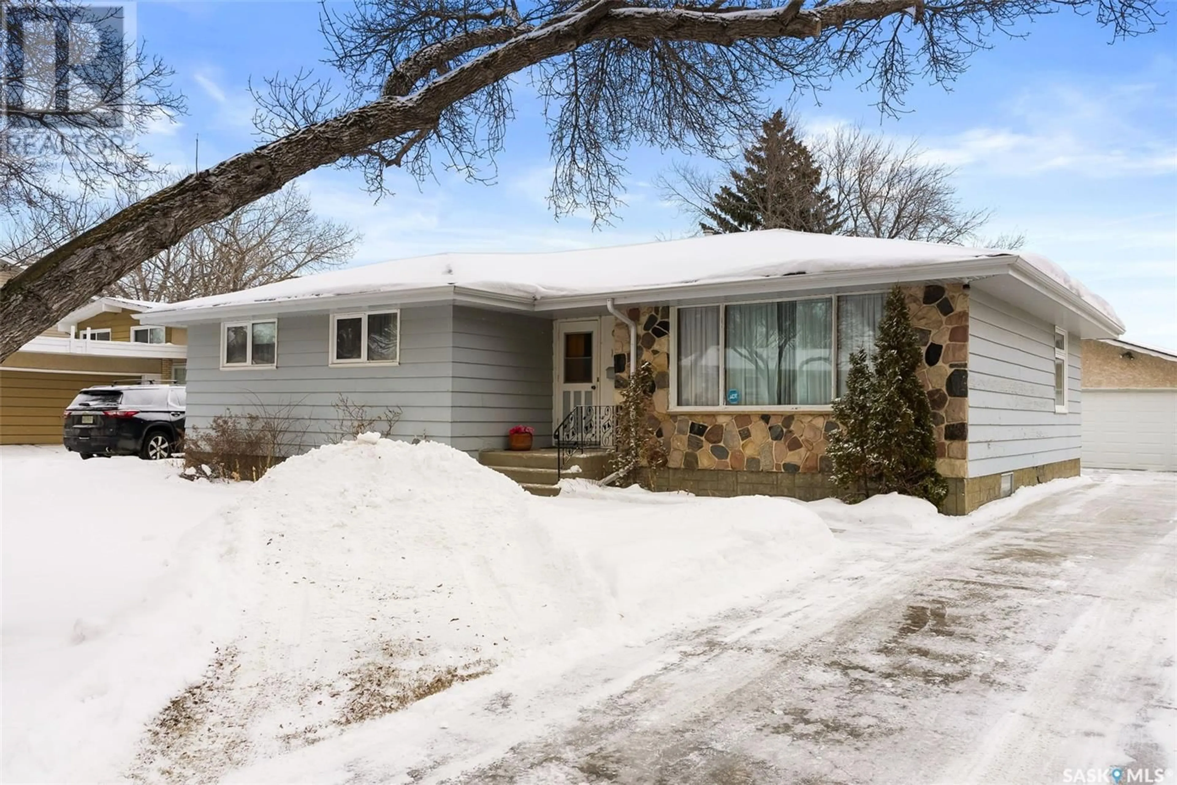 Home with vinyl exterior material, street for 109 Milne STREET N, Regina Saskatchewan S4R5B8