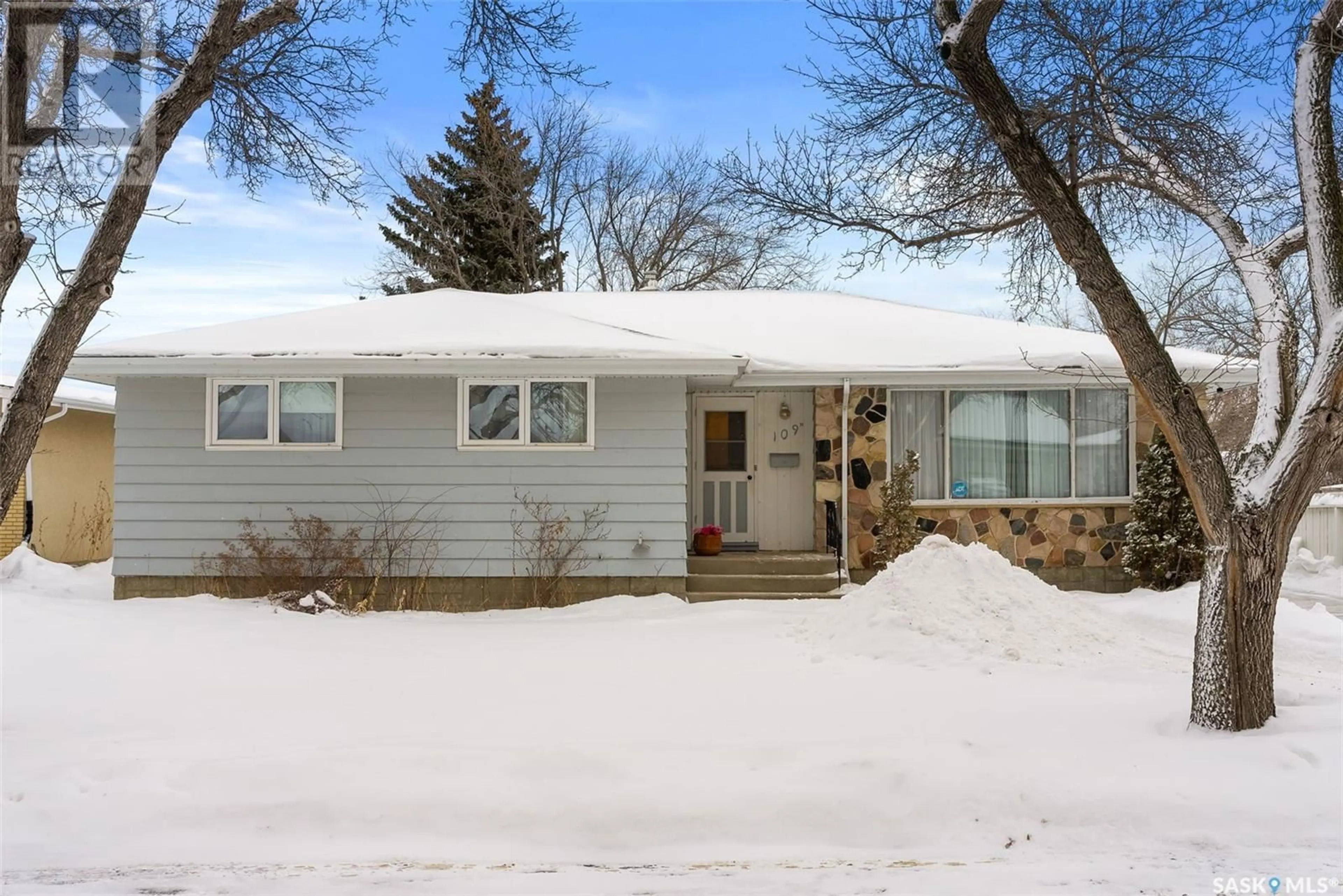 Home with vinyl exterior material, street for 109 Milne STREET N, Regina Saskatchewan S4R5B8