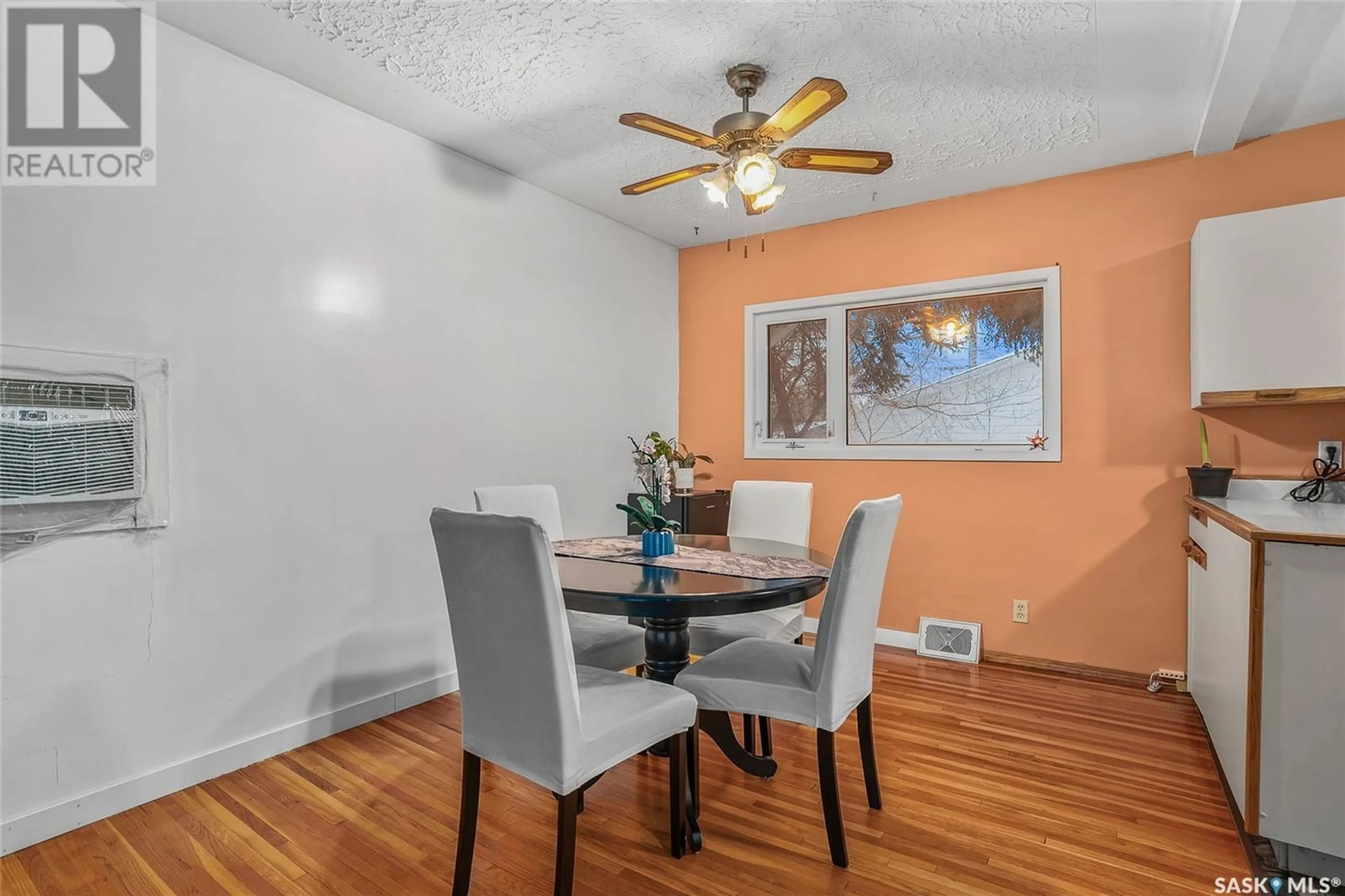 Dining room, wood/laminate floor for 2205 BROADWAY AVENUE, Saskatoon Saskatchewan S7J0Y5