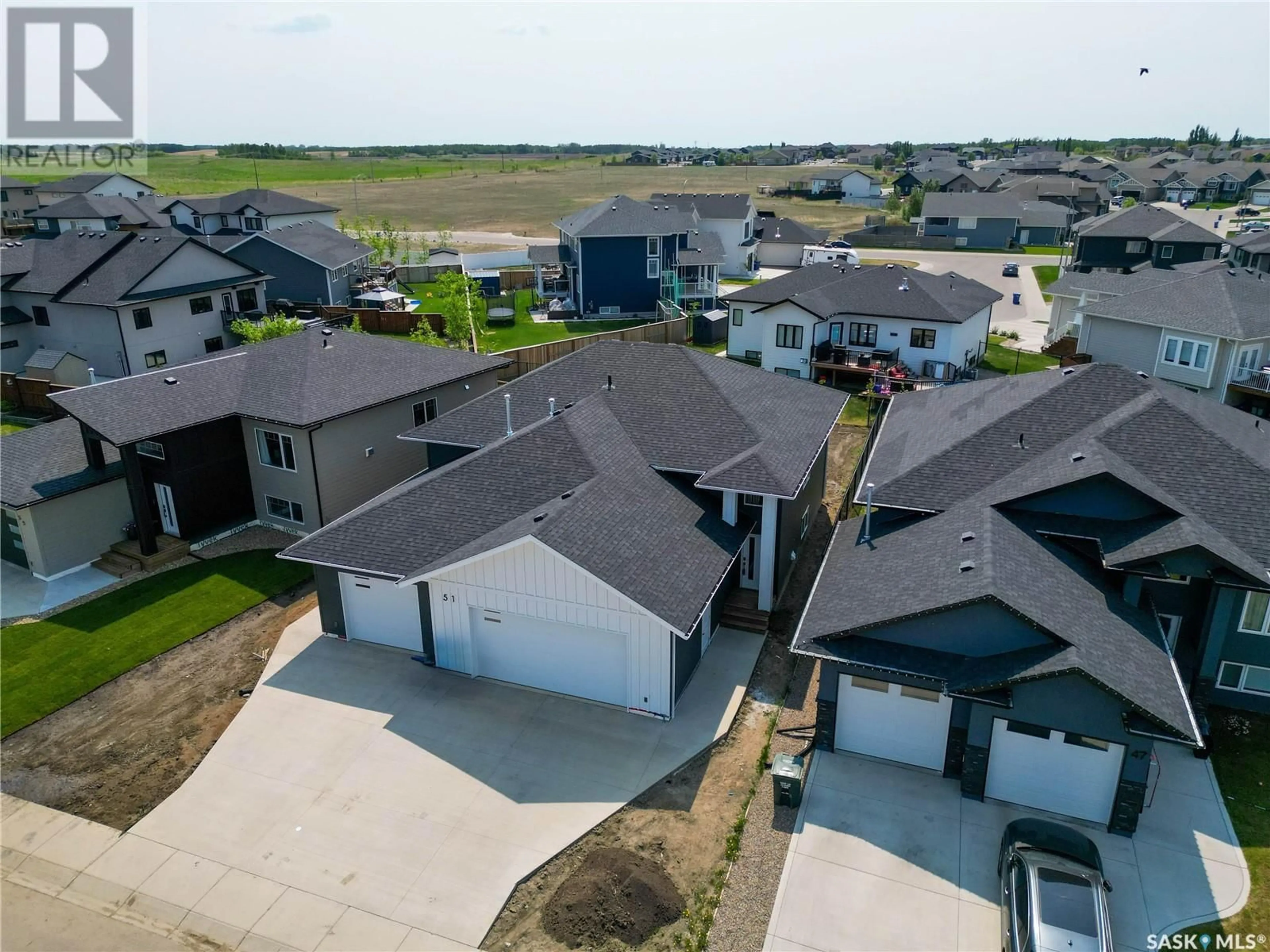 A pic from outside/outdoor area/front of a property/back of a property/a pic from drone, street for 51 HADLEY ROAD, Prince Albert Saskatchewan S6X0A4
