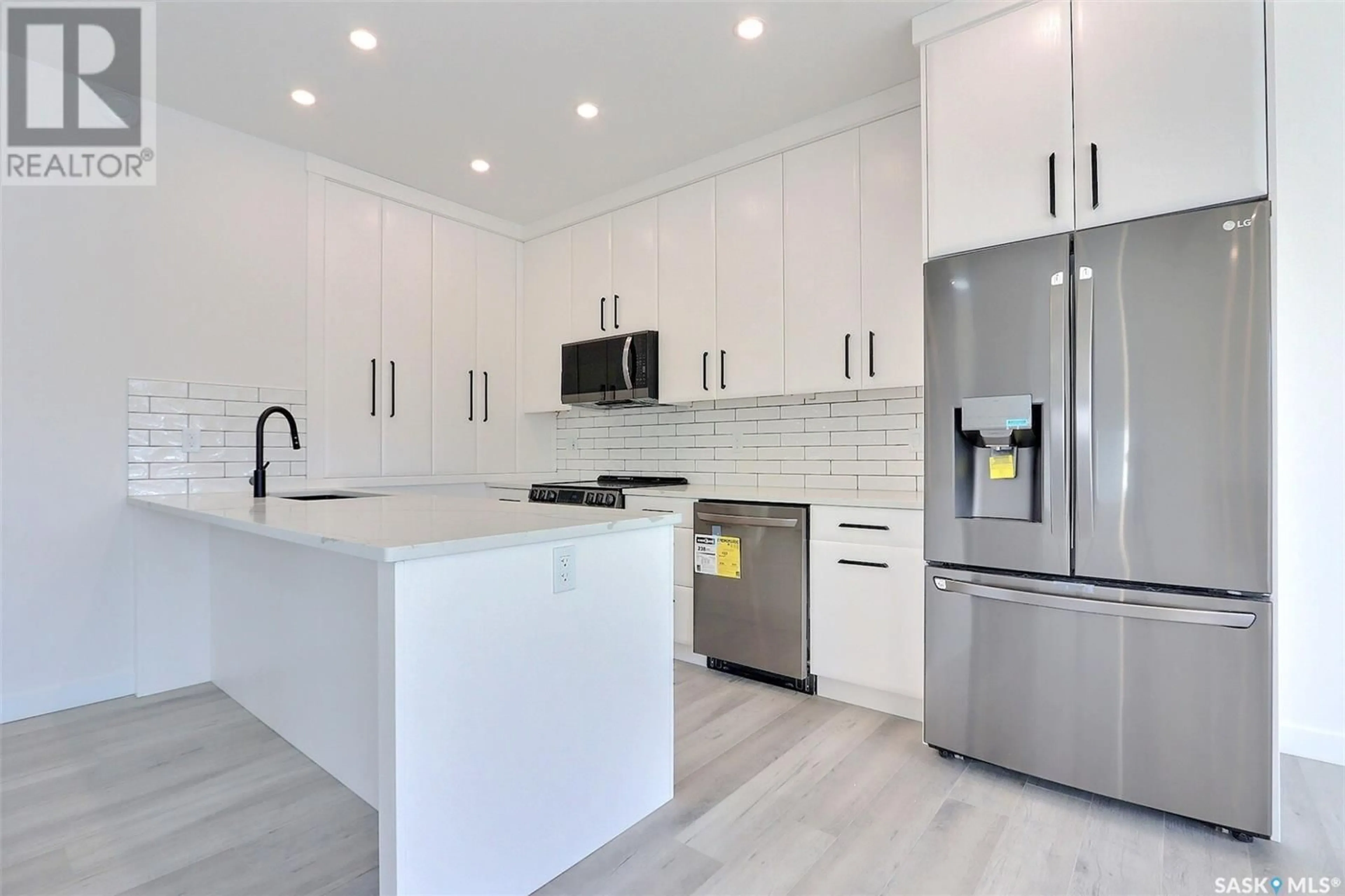 Open concept kitchen, ceramic/tile floor for 51 HADLEY ROAD, Prince Albert Saskatchewan S6X0A4