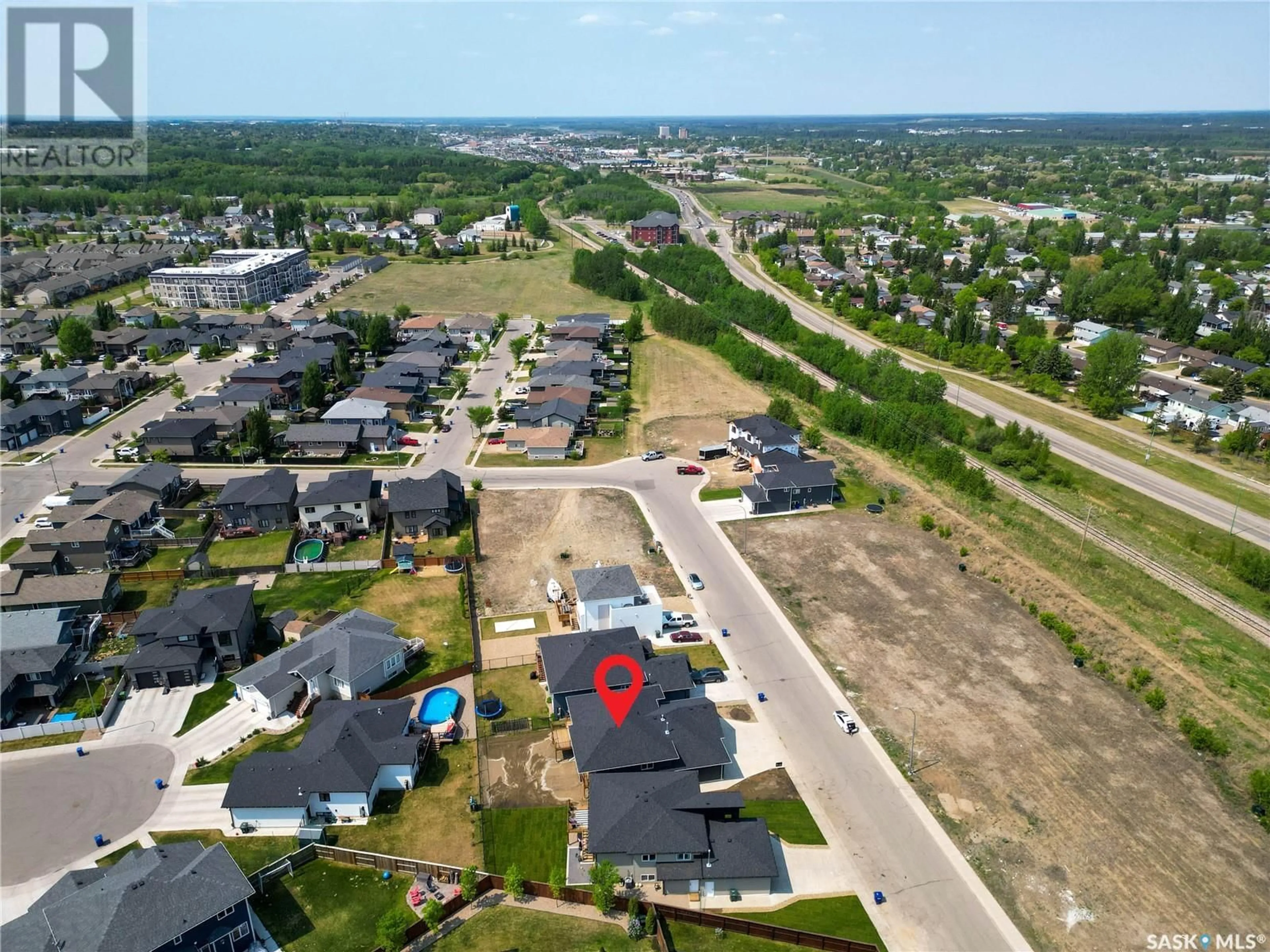 A pic from outside/outdoor area/front of a property/back of a property/a pic from drone, street for 51 HADLEY ROAD, Prince Albert Saskatchewan S6X0A4