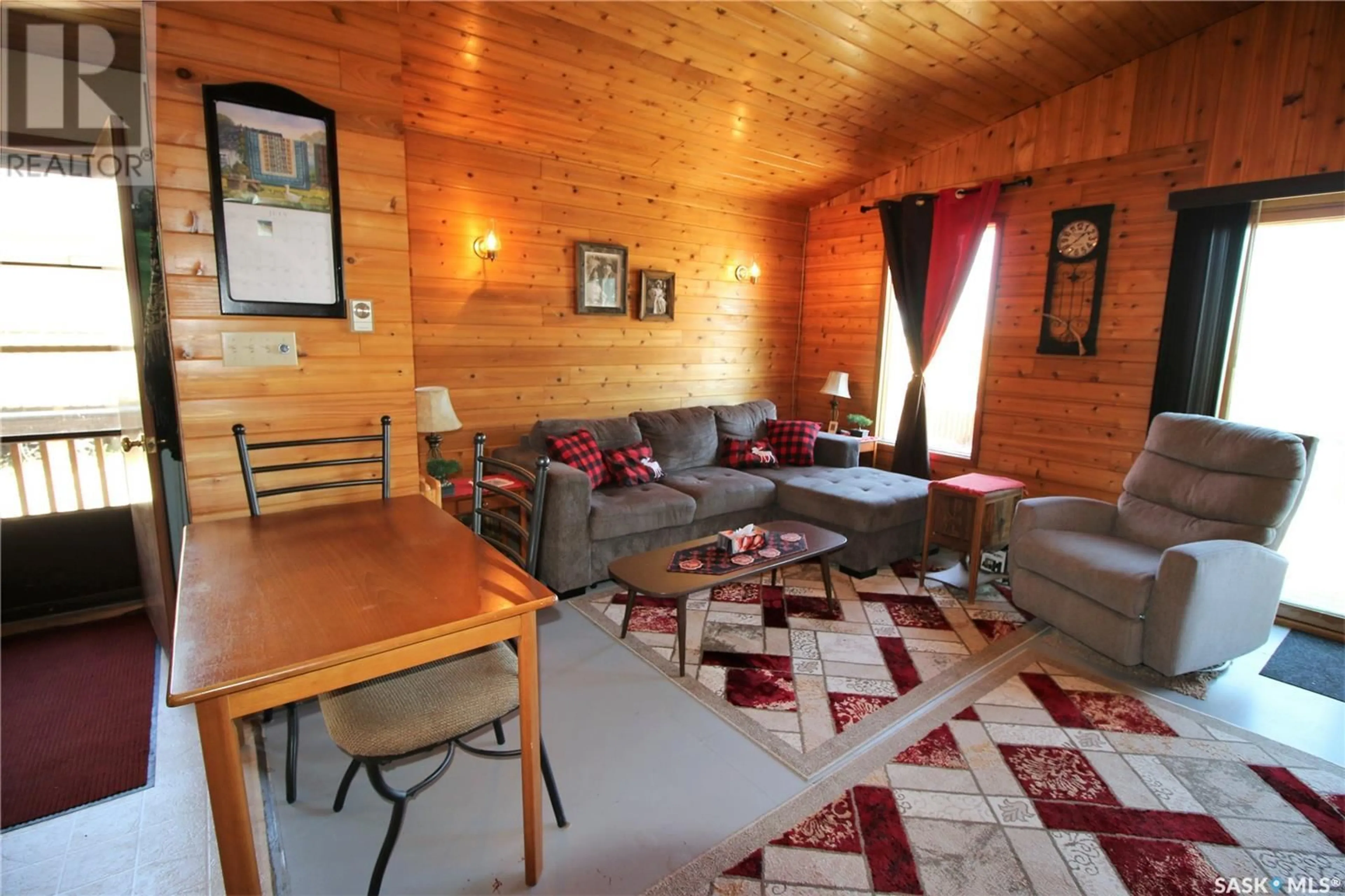 Living room with furniture, wood/laminate floor for Lot 37 Sub 2 (Leased Lot), Meeting Lake Saskatchewan S0M2L0