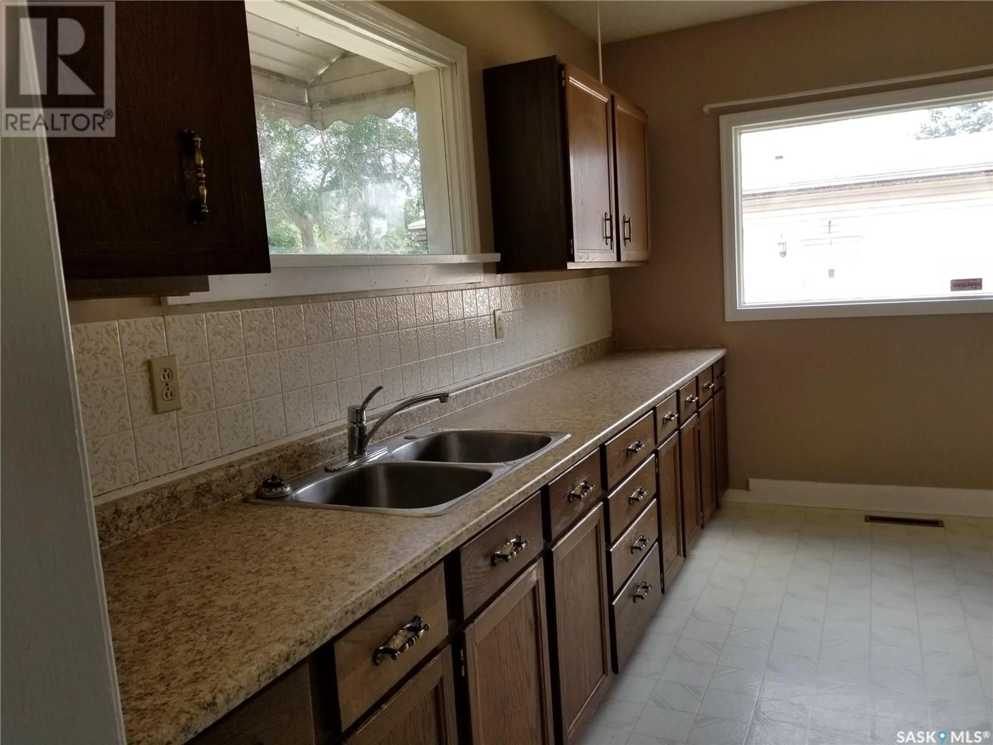 Standard kitchen, ceramic/tile floor for 525 3rd AVENUE E, Unity Saskatchewan S0K4L0