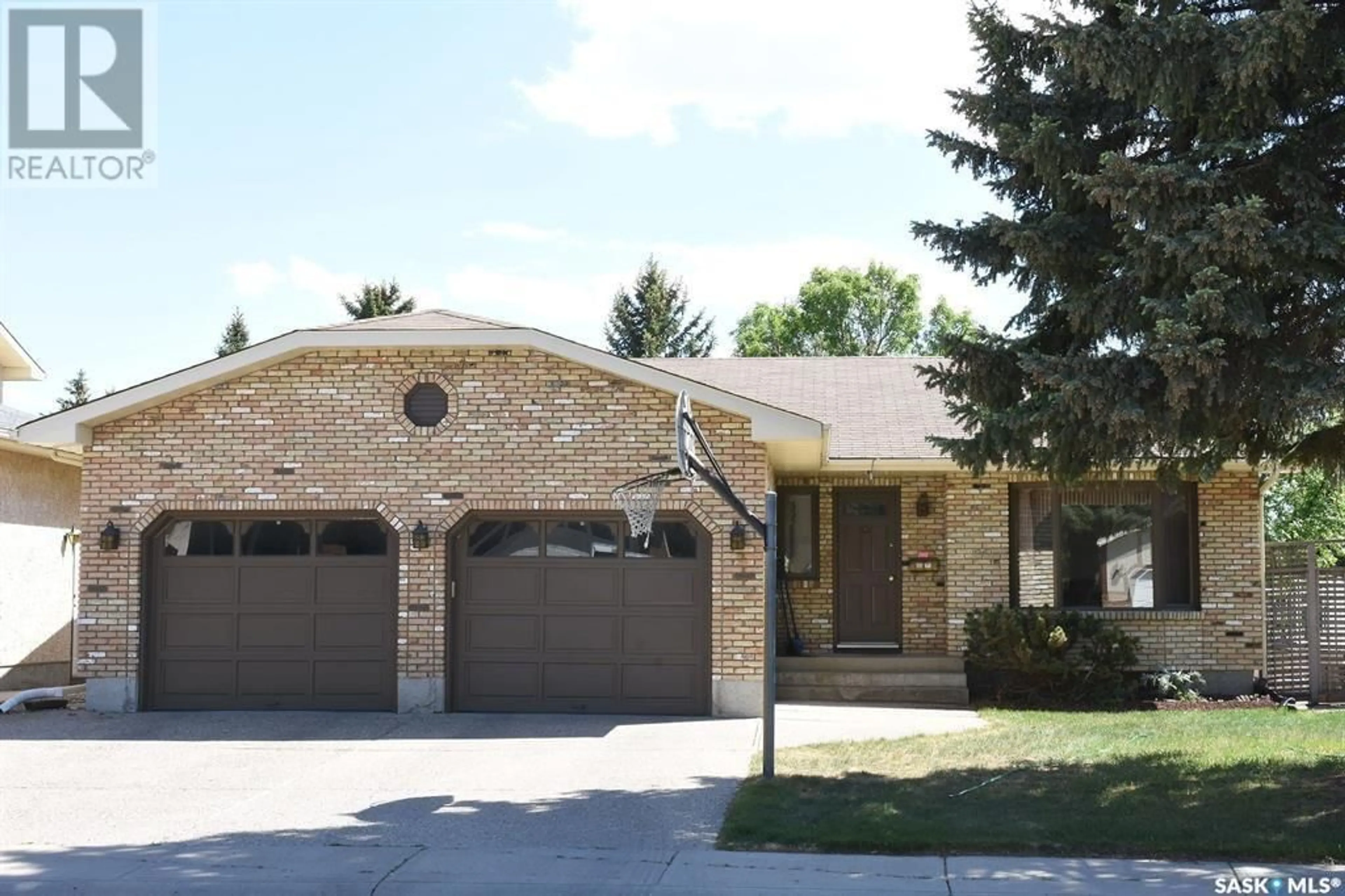 Home with brick exterior material, street for 3023 REVES ROAD, Regina Saskatchewan S4V2C7