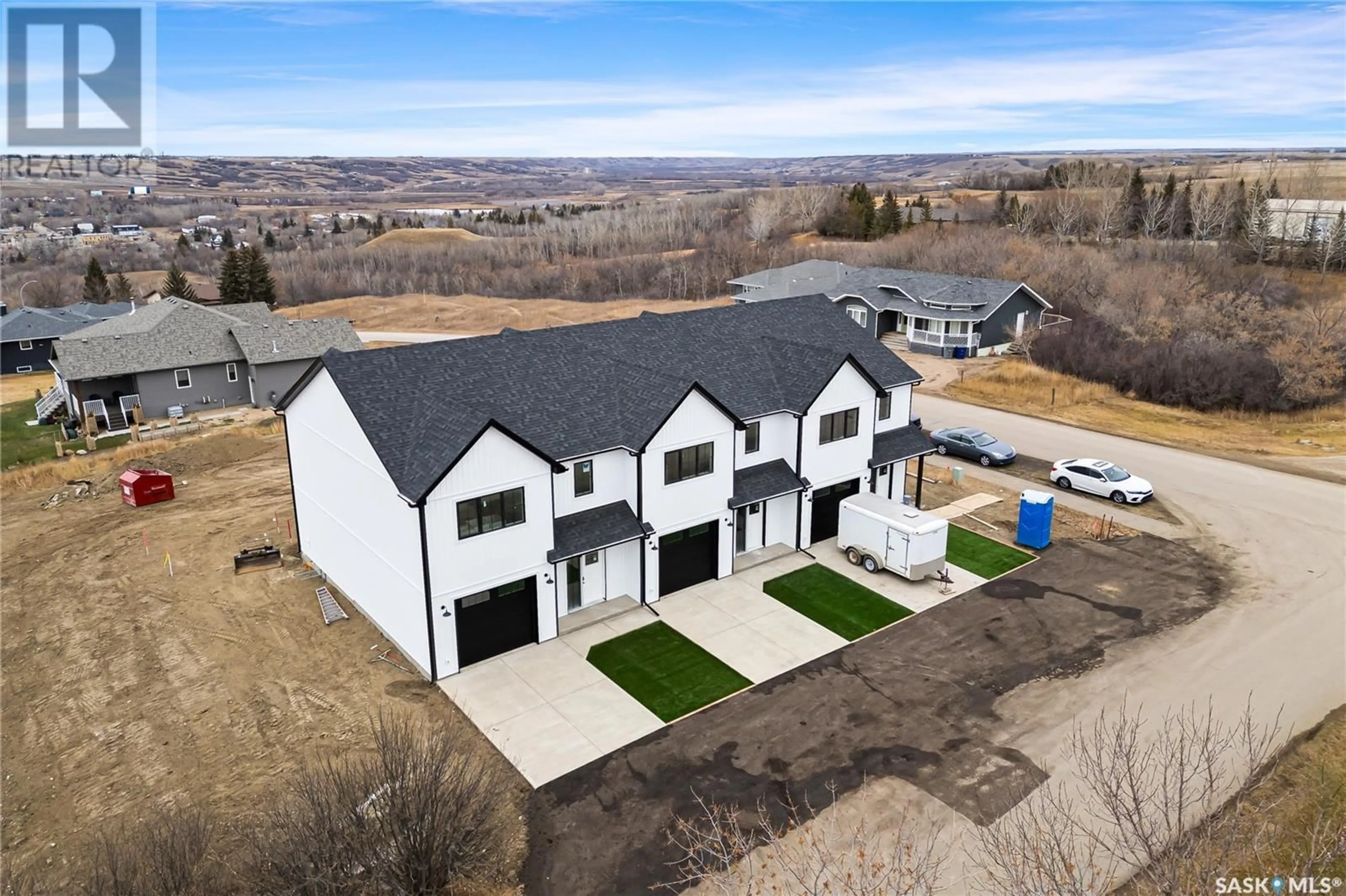 A pic from outside/outdoor area/front of a property/back of a property/a pic from drone, mountain view for 6 James BAY, Lumsden Saskatchewan S0G3C0