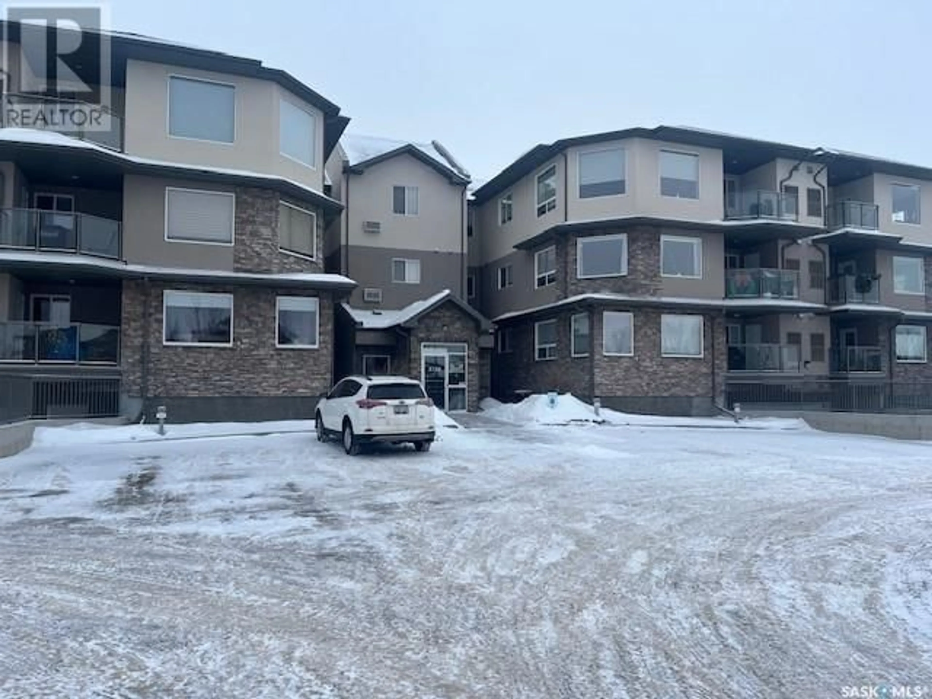 A pic from outside/outdoor area/front of a property/back of a property/a pic from drone, building for 305 3750 Haughton ROAD E, Regina Saskatchewan S4V1R6