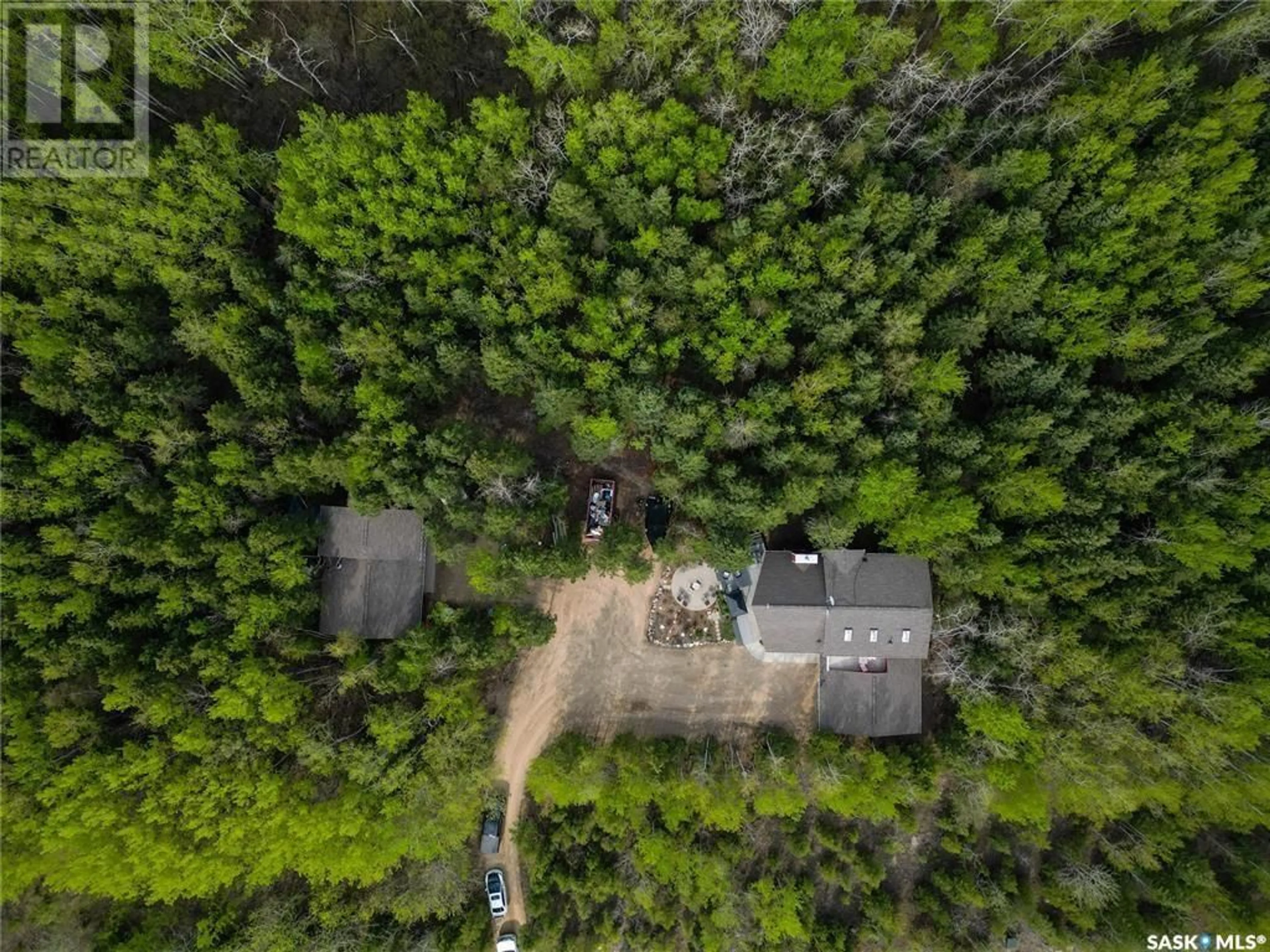 A pic from outside/outdoor area/front of a property/back of a property/a pic from drone, forest/trees view for 116 Aspen CRESCENT, Paddockwood Rm No. 520 Saskatchewan S0J0N0