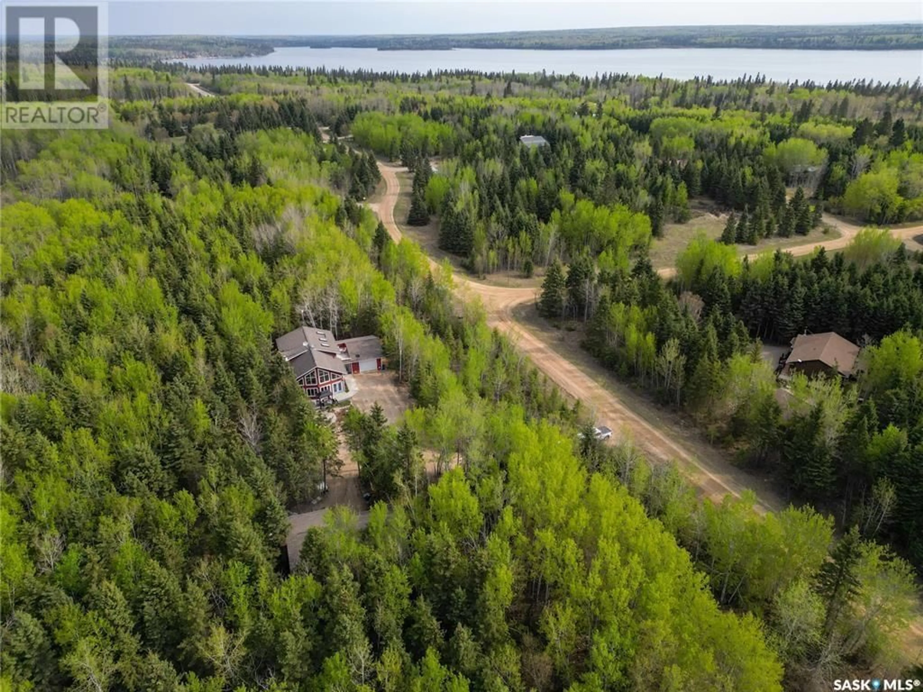 A pic from outside/outdoor area/front of a property/back of a property/a pic from drone, water/lake/river/ocean view for 116 Aspen CRESCENT, Paddockwood Rm No. 520 Saskatchewan S0J0N0