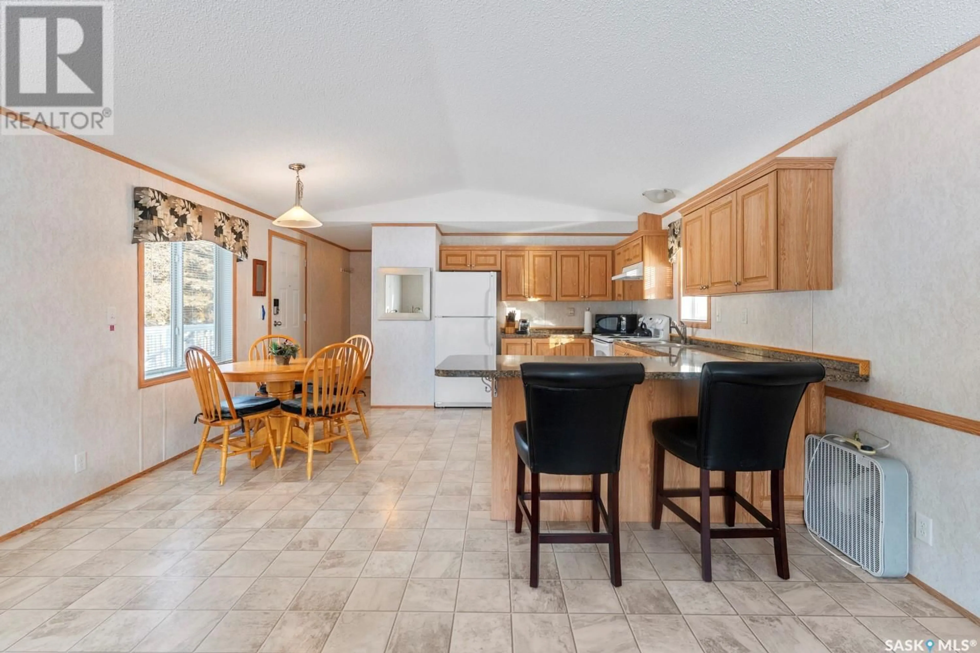 Open concept kitchen, ceramic/tile floor for 3 St Boniface AVENUE, Goodsoil Saskatchewan S0M1A0