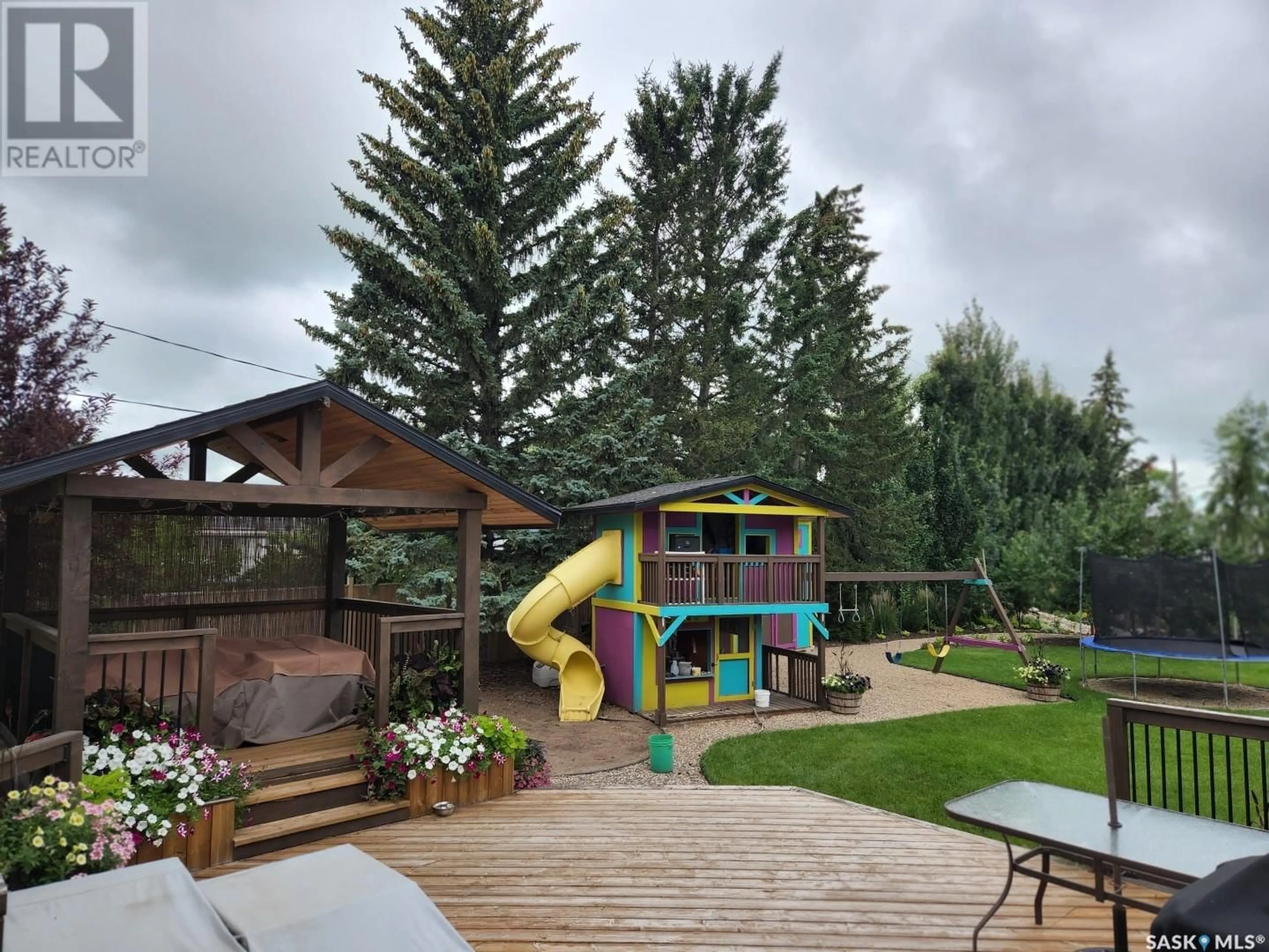 A pic from outside/outdoor area/front of a property/back of a property/a pic from drone, mountain view for 706 Grey AVENUE, Grenfell Saskatchewan S0G2B0