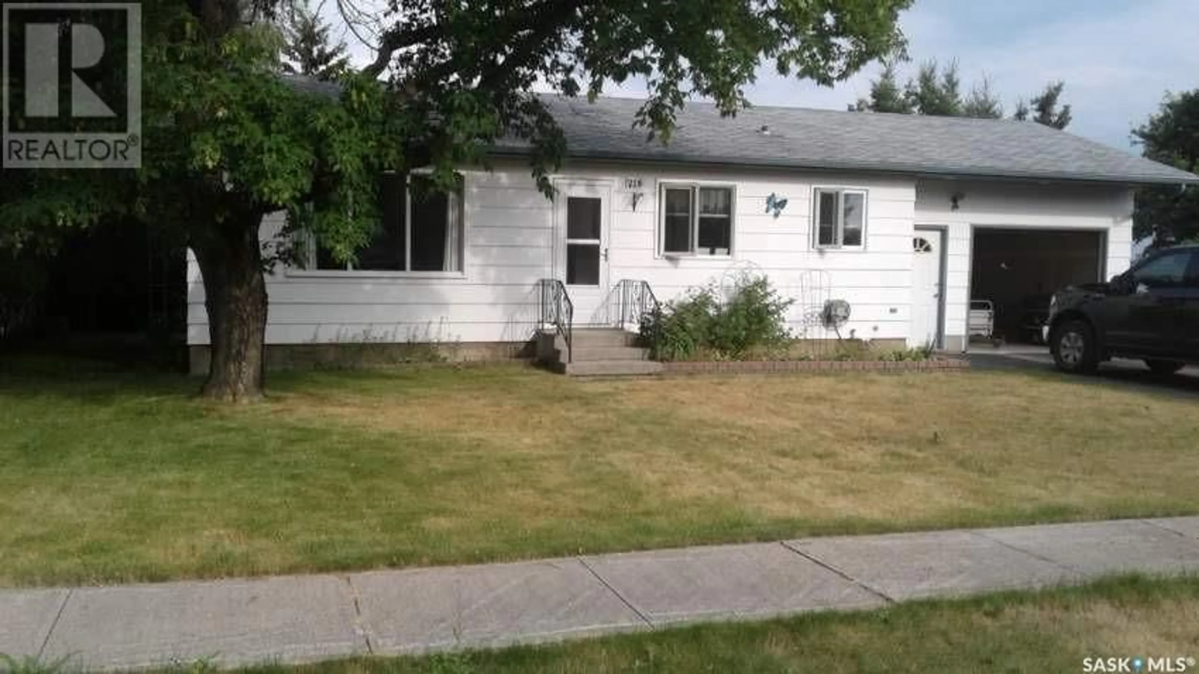 Home with vinyl exterior material, street for 218 King STREET, Quinton Saskatchewan S0A3G0