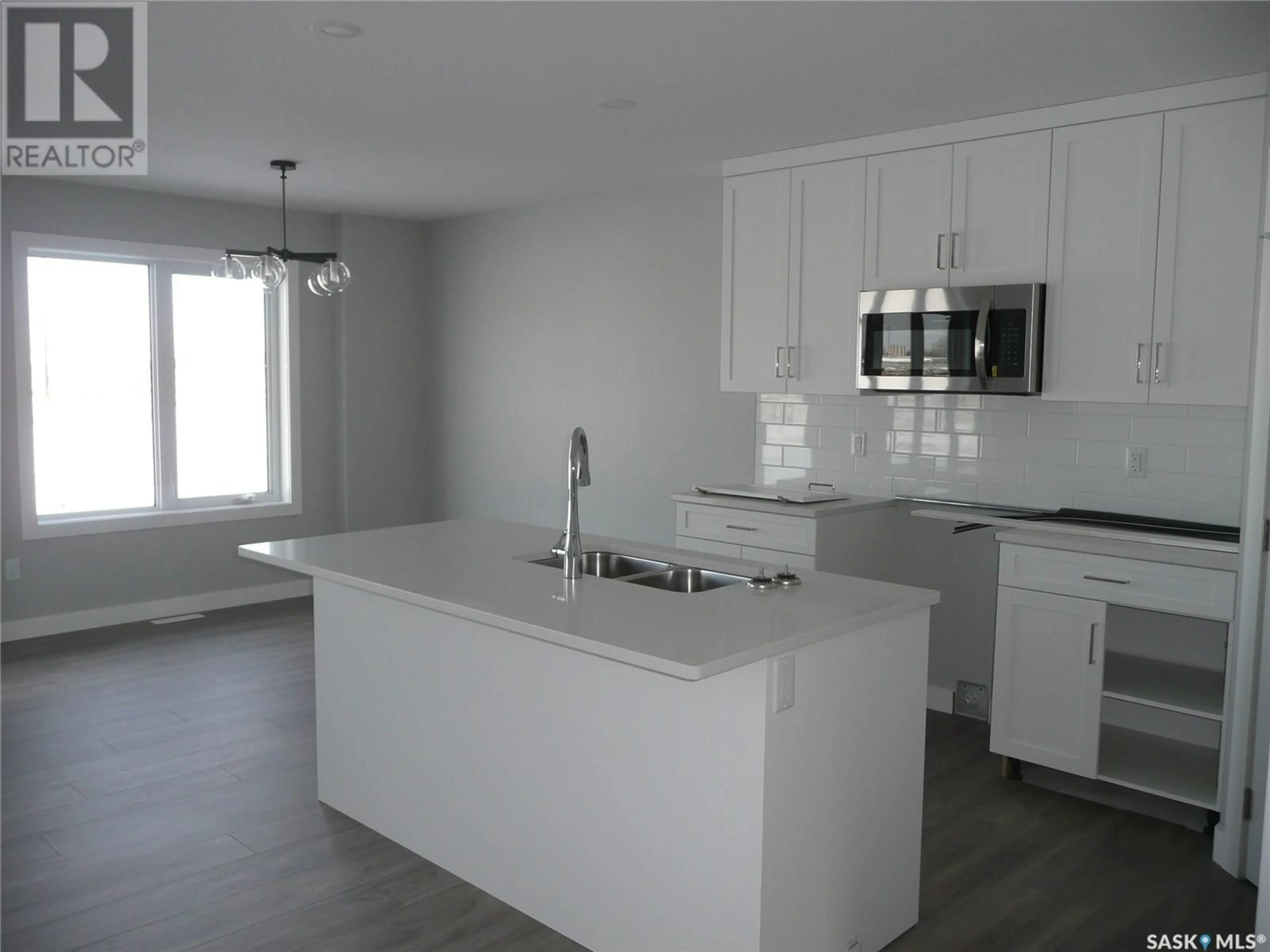 Open concept kitchen, unknown for 276 Oliver LANE, Martensville Saskatchewan S0K2T0