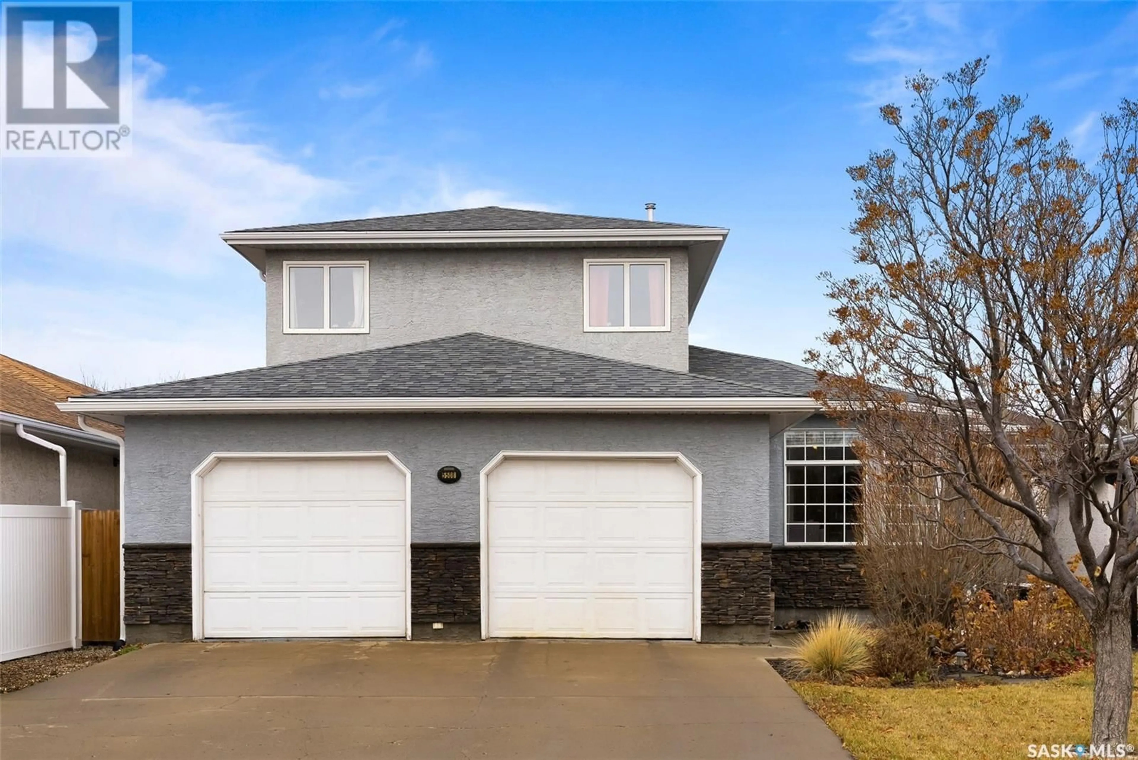 Home with vinyl exterior material, street for 5508 CHESTER PLACE, Regina Saskatchewan S4X4G4